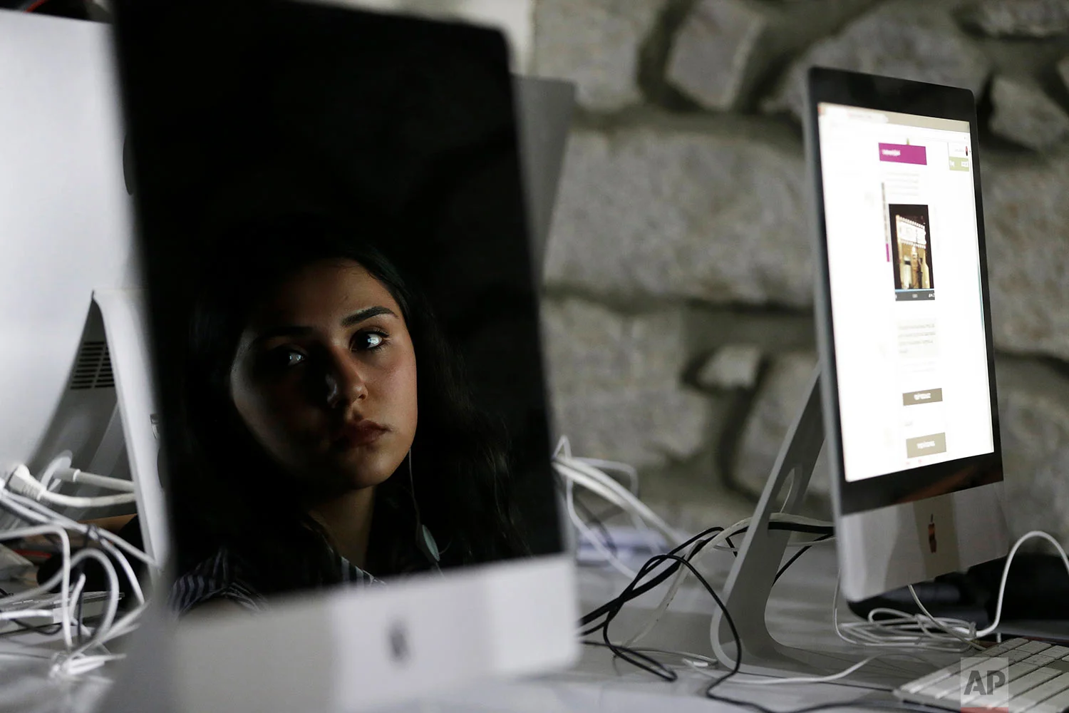 In this Friday, May 11, 2018, a teenager taking a course at TUMO, an after-school training center, in Stepanakert. (AP Photo/Thanassis Stavrakis)