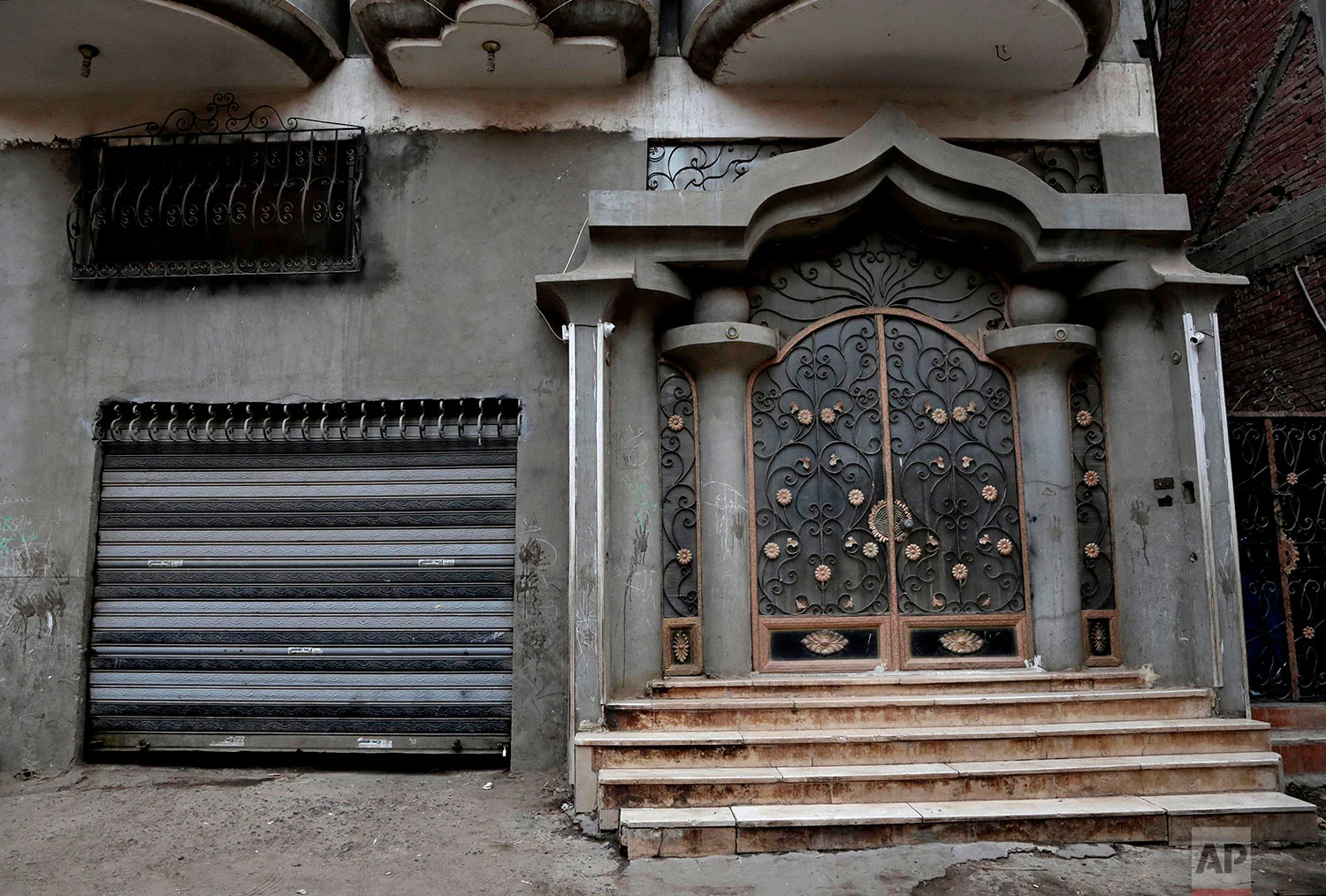 The entrance of the building where Salah grew up. (AP Photo/Nariman El-Mofty)