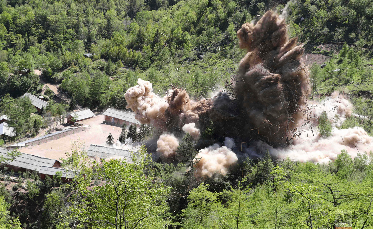  Command post facilities of North Korea's nuclear test site are exploded in Punggye-ri, North Korea on Thursday, May 24, 2018. North Korea said Friday that it's still willing to sit for talks with the United States "at any time, (in) any format," a r