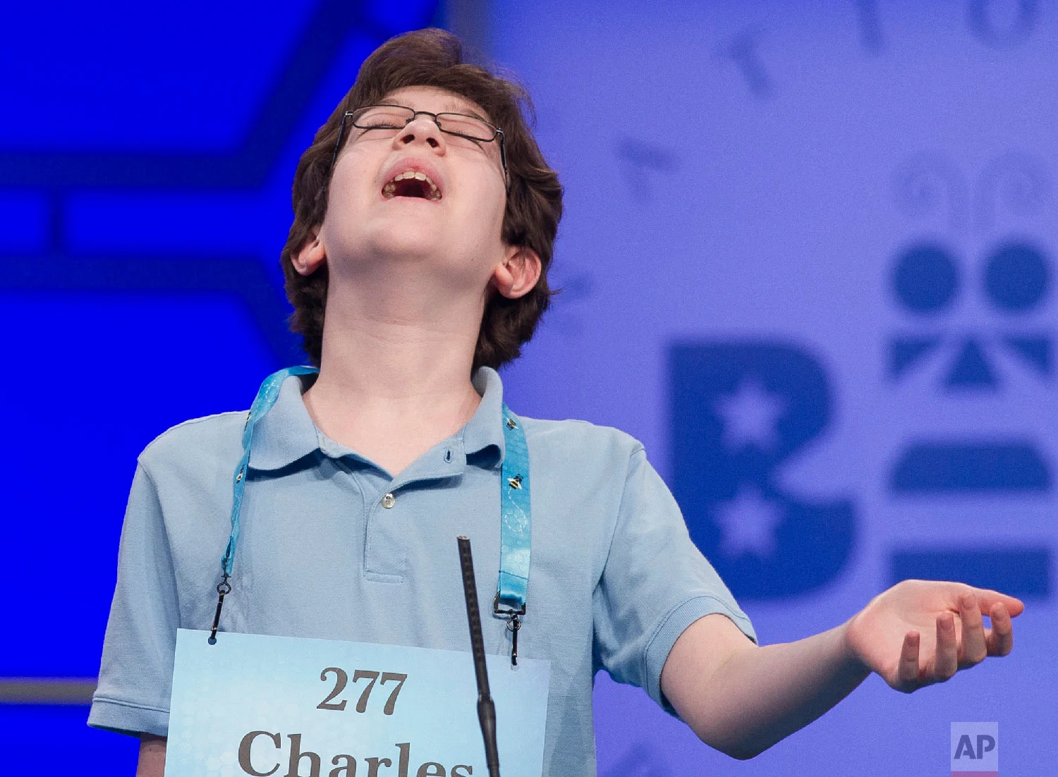 Charles Millard, 13, from Frederick, Md., misspells his word during the second round of the Scripps National Spelling Bee in Oxon Hill, Md., Tuesday, May 29, 2018. (AP Photo/Cliff Owen)