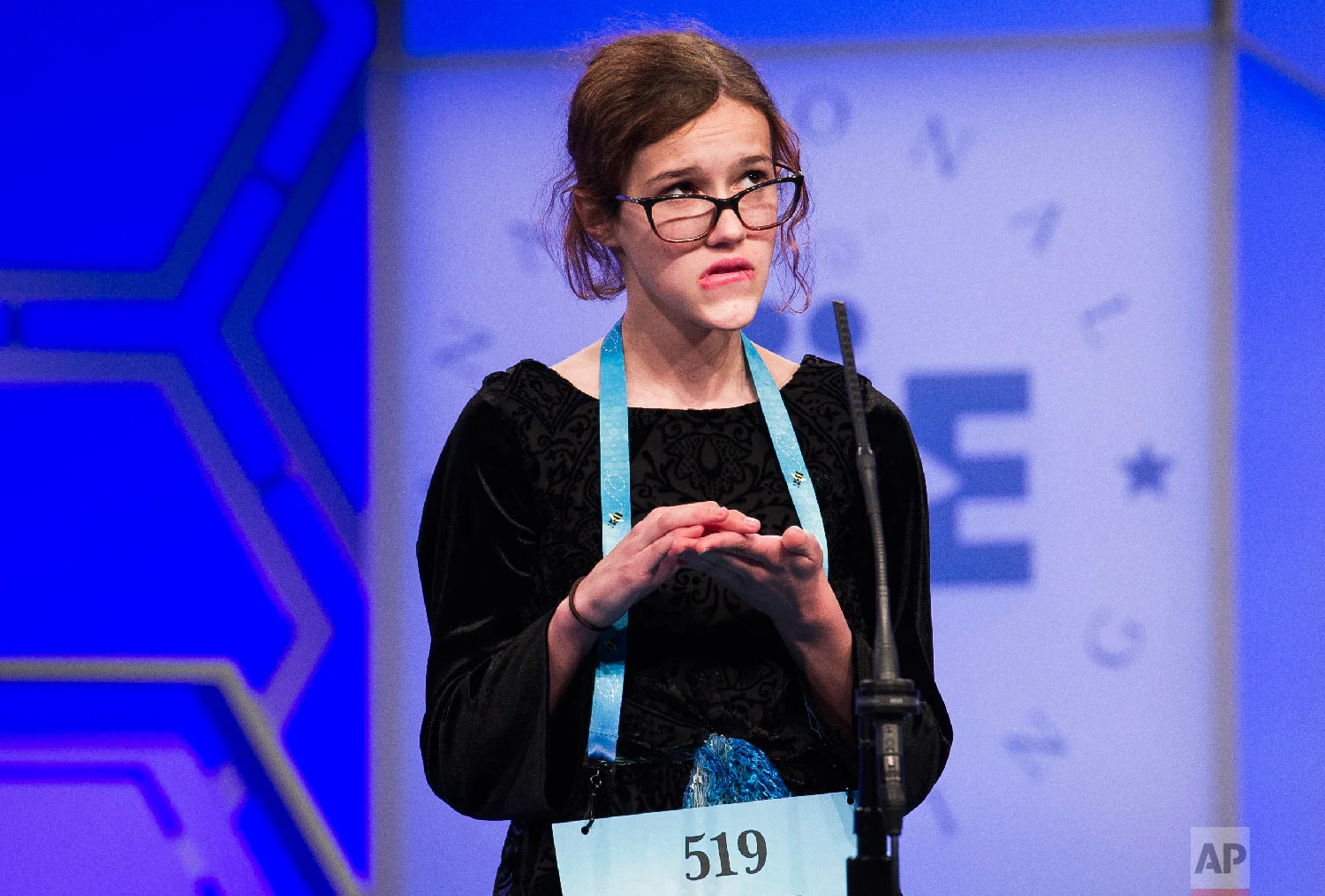 The last speller of the day, Eleanor Tallman, 13, from Flower Mound, Texas, spells her word incorrectly during the second round of the Scripps National Spelling Bee in Oxon Hill, Md., Tuesday, May 29, 2018. (AP Photo/Cliff Owen)