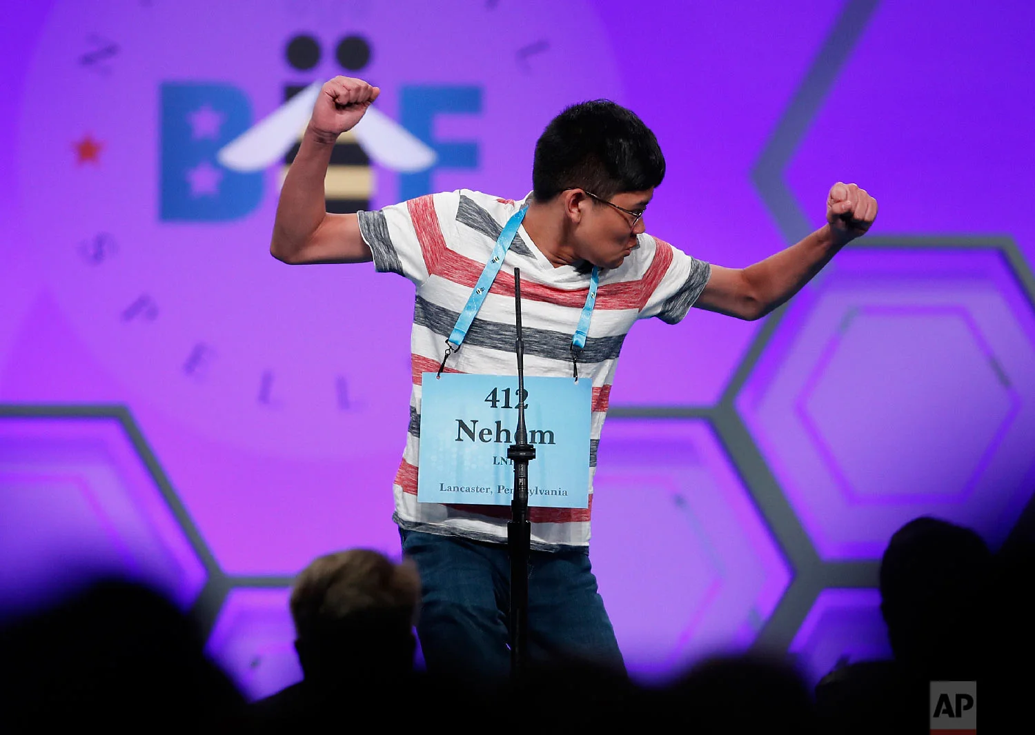 Nehem Felices, 13, from Lancaster, Pa., reacts after spelling a word correctly during the 3rd Round of the Scripps National Spelling Bee in Oxon Hill, Md., Wednesday, May 30, 2018. (AP Photo/Carolyn Kaster)