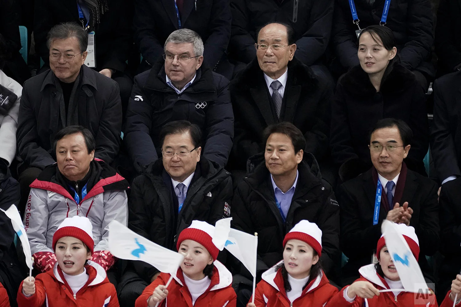 Kim Yo Jong, sister of North Korean leader Kim Jong Un, top right, and North Korea's nominal head of state Kim Yong Nam, second right, Thomas Bach, President of the International Olympic Committee, and South Korean President Moon Jae-in, top left, watch the preliminary round of the women's hockey game between Switzerland and the combined Koreas at the 2018 Winter Olympics in Gangneung, South Korea, Feb. 10, 2018 . (AP Photo/Felipe Dana)