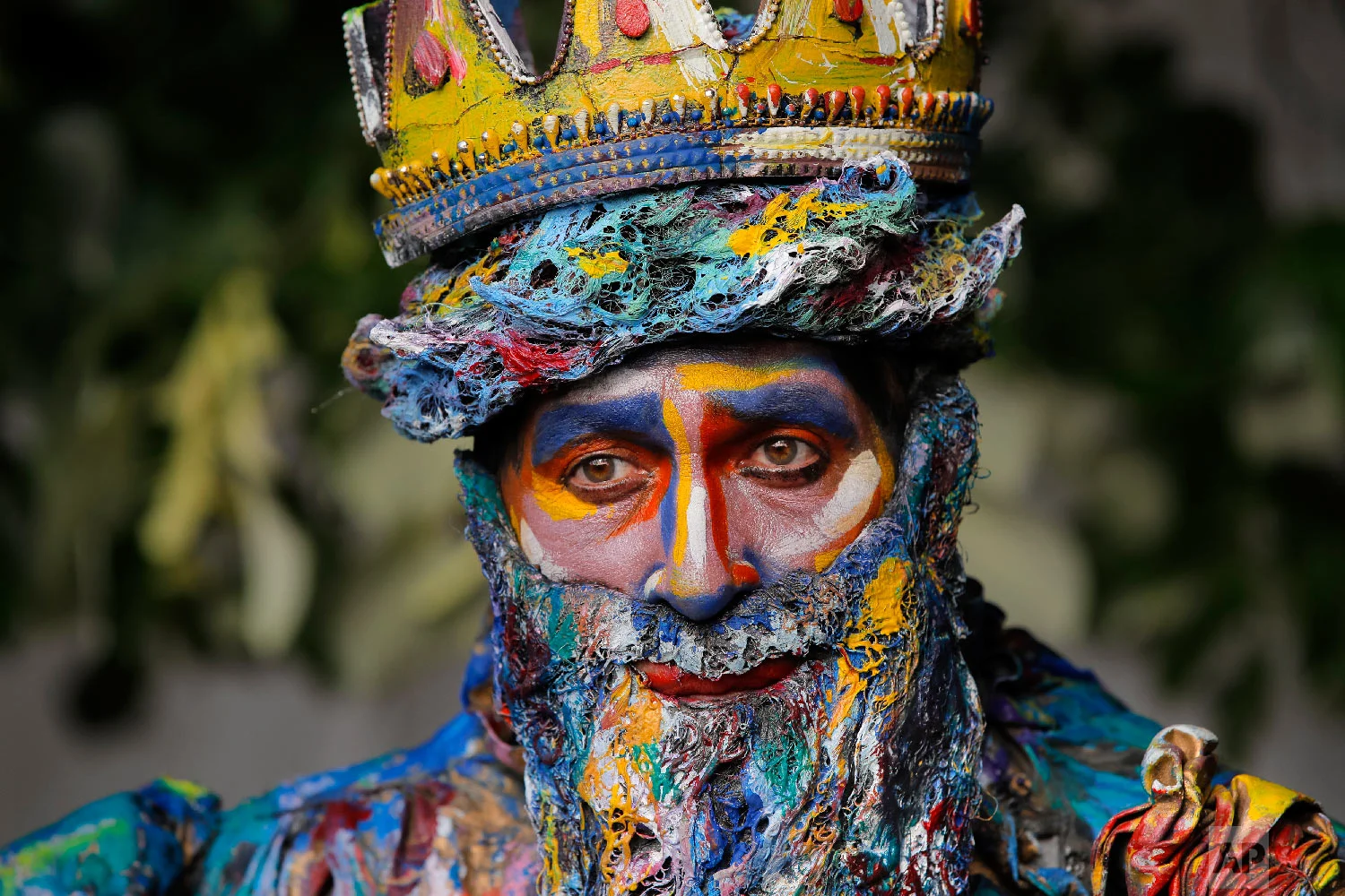 Marta Teresa da Rocha, of Spain's Alucinarte Animacion Teatral walks in a park before performing in the Living Statues International Festival, in Bucharest, Romania on Sunday, May 27, 2018. (AP Photo/Vadim Ghirda)