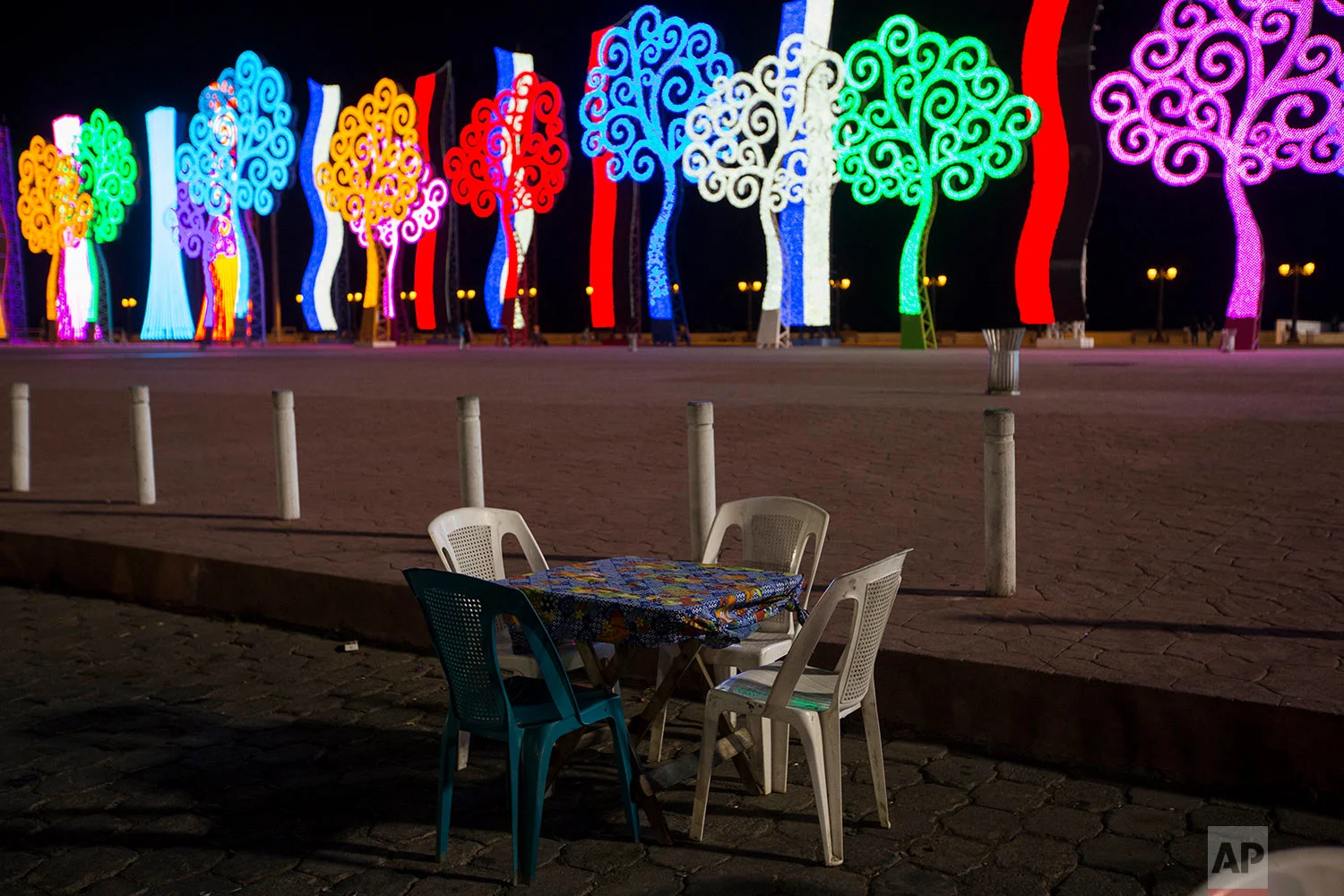 "Tree of Life" metal sculptures line the lake in Managua, Nicaragua, Friday, May 4, 2018. When protests against a change to Nicaragua's social security system turned confrontational, the favorite targets of the more destructive demonstrators were the so-called "Trees of Life" that line some of Managua's main thoroughfares. (AP Photo/Moises Castillo)