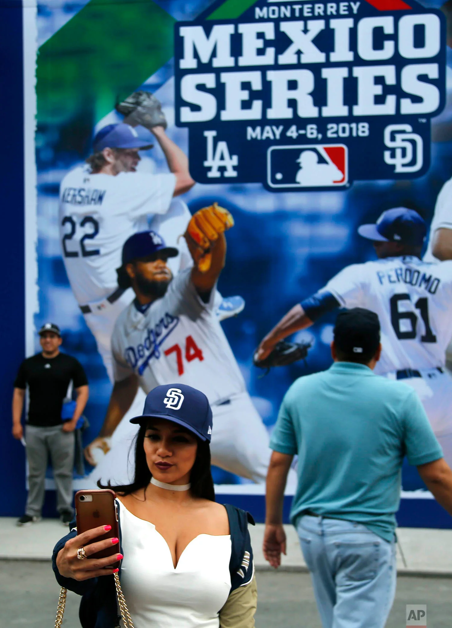 A fan takes a selfie at the stadium before a major league baseball game between the San Diego Padres and Los Angeles Dodgers in Monterrey, Mexico, Friday, May 4, 2018. (AP Photo/ Eduardo Verdugo)