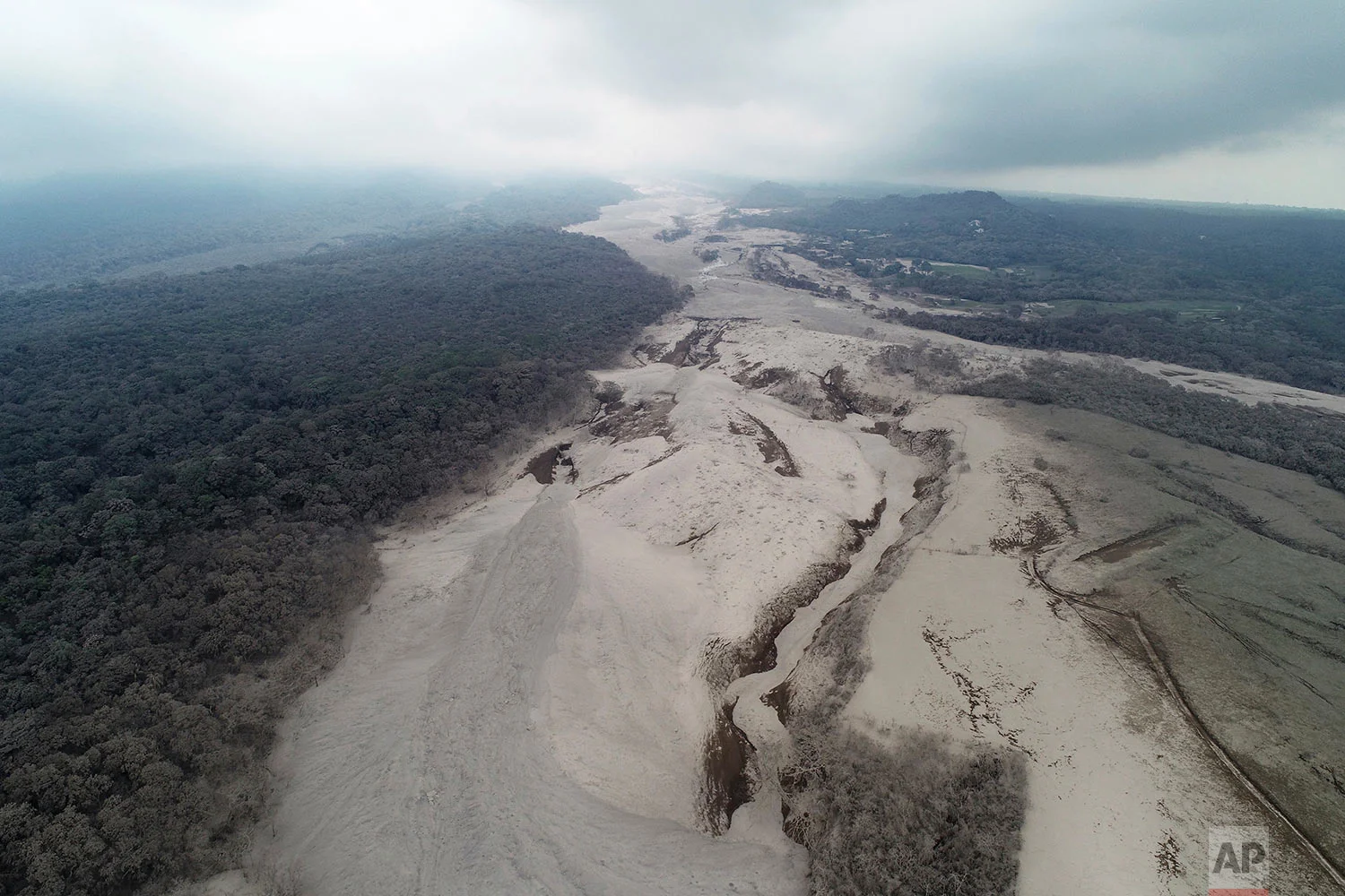 This aerial view shows the disaster zone near the Volcan de Fuego, or "Volcano of Fire," in Escuintla, Guatemala. (AP Photo/Rodrigo Abd)