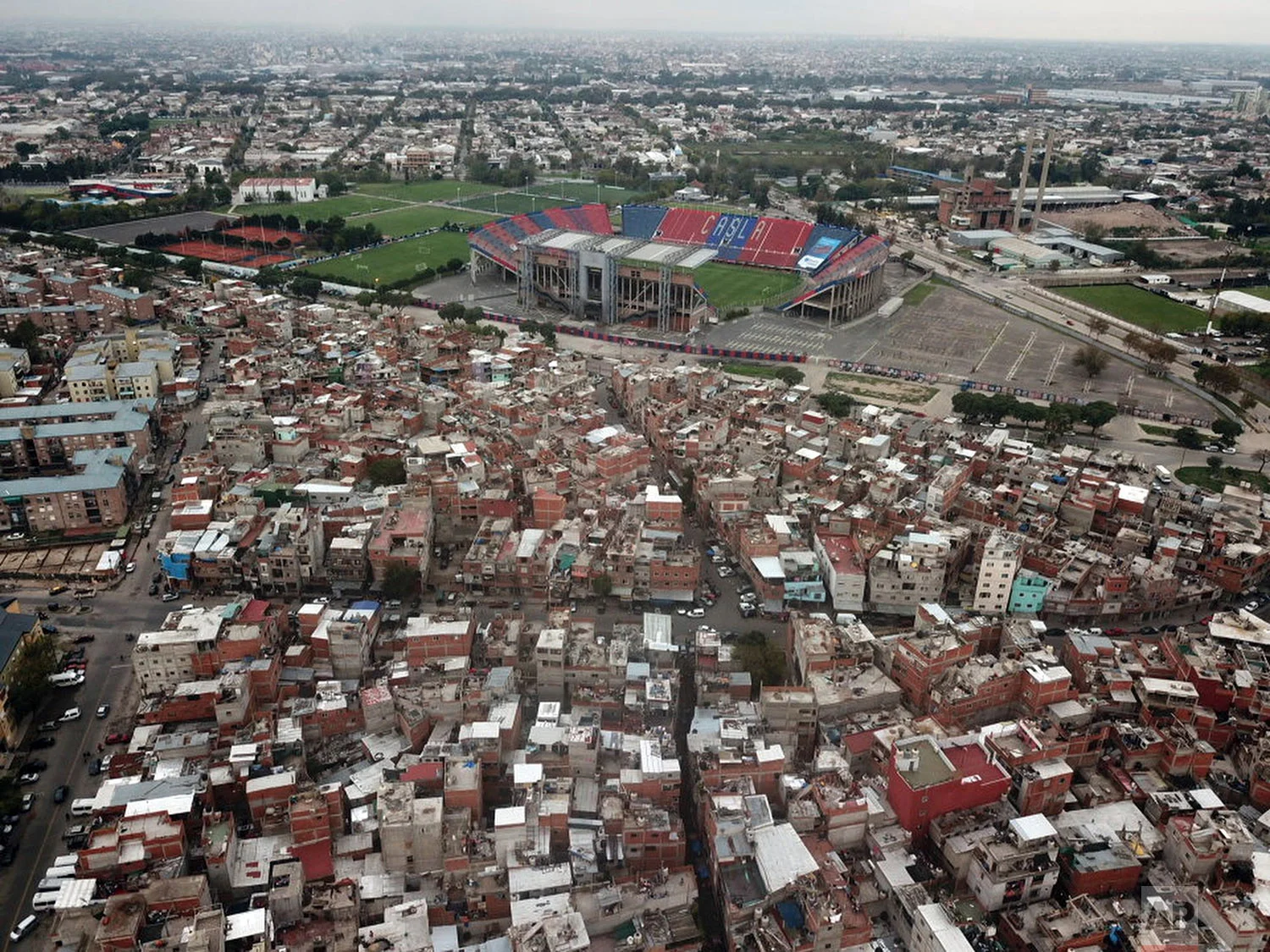 The San Lorenzo soccer team stadium stands amid low income homes in the "Bajo Flores" neighborhood of Buenos Aires, Argentina, April 27, 2018. (AP Photo/Rodrigo Abd)