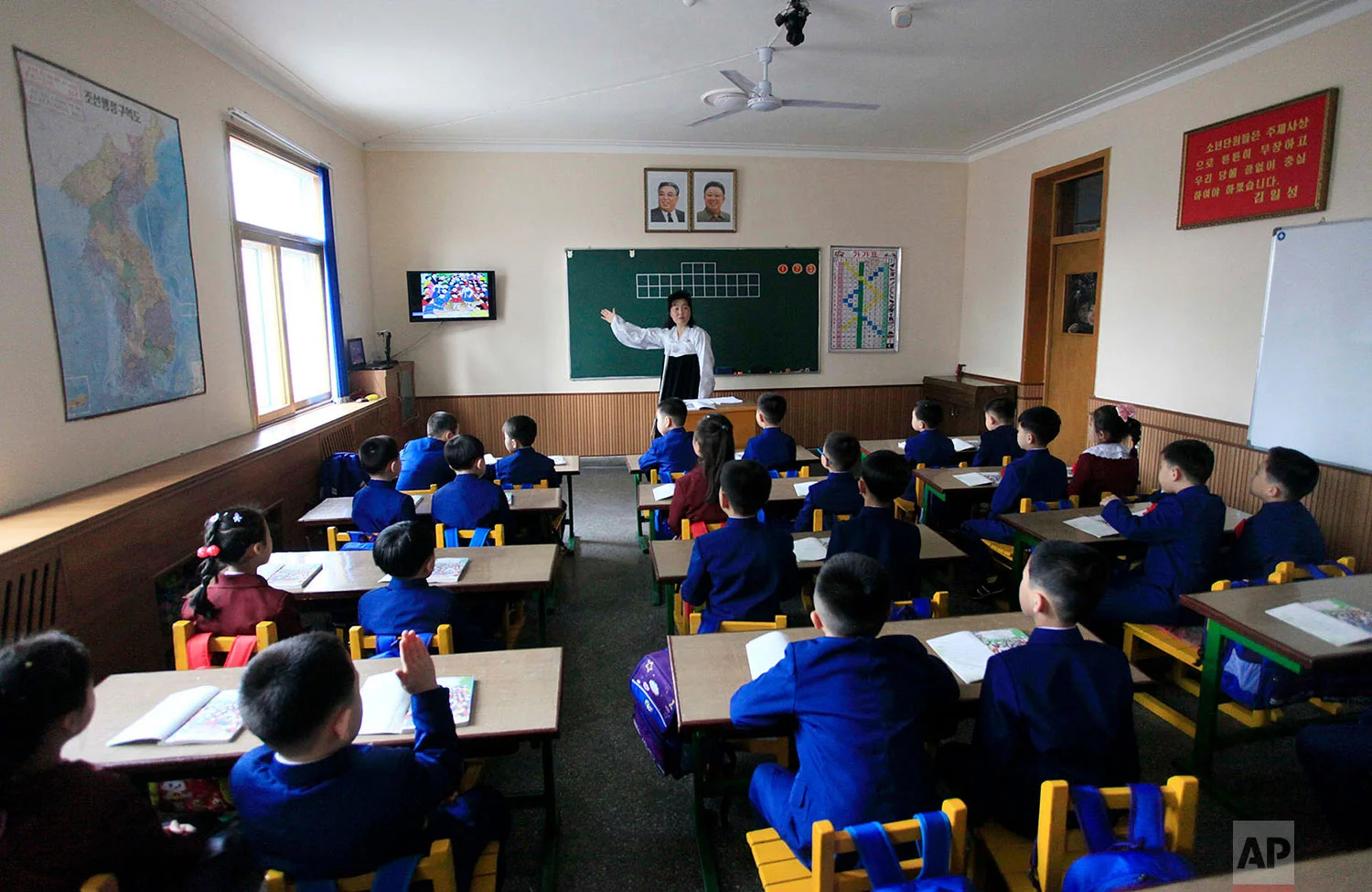 Students attend their first day of class at the Ryonhwa primary school in Pyongyang, North Korea, on April 2, 2018. (AP Photo/Jon Chol Jin)