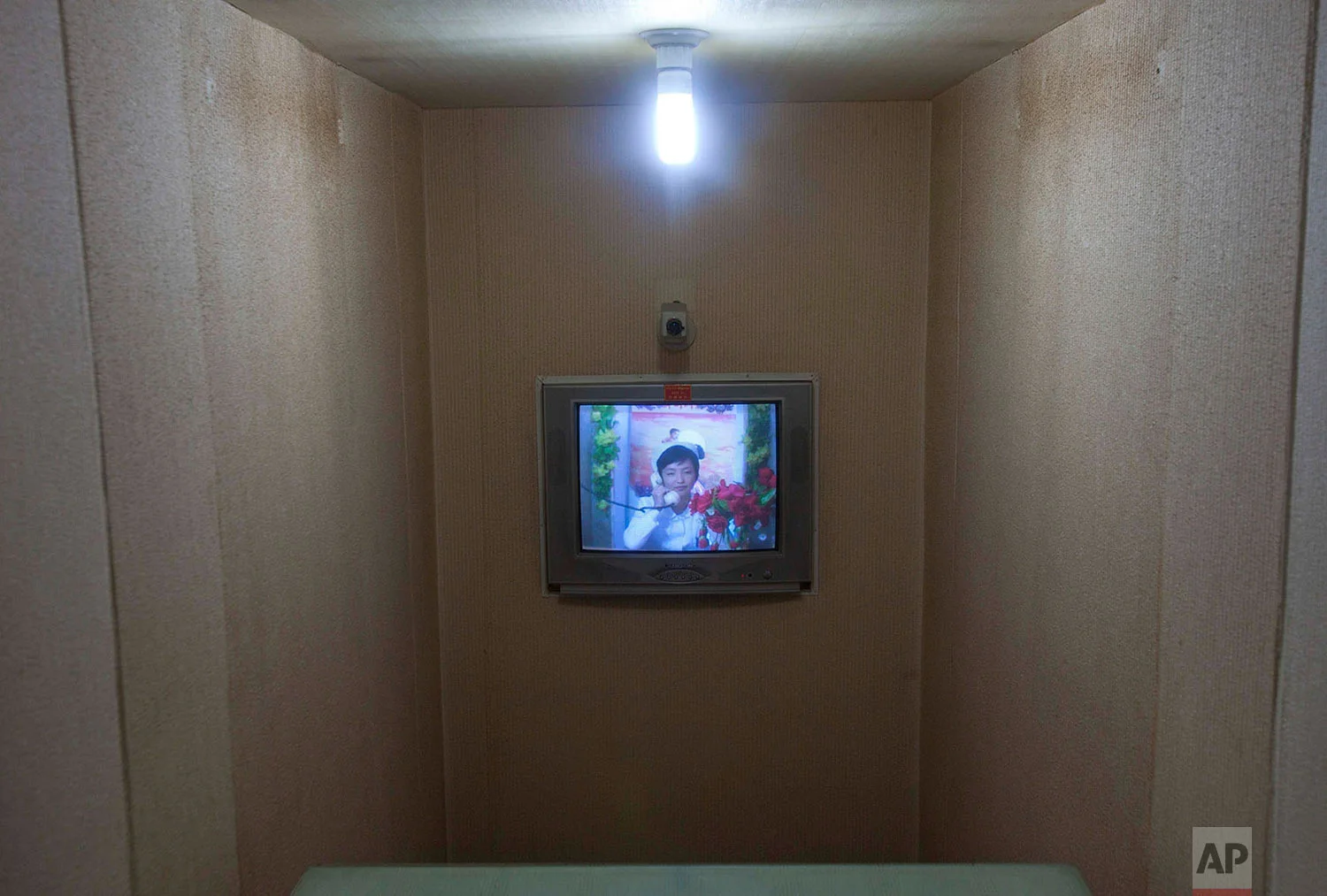 A North Korean nurse speaks by video conference and telephone to a doctor inside a maternity hospital in Pyongyang, North Korea, on Oct. 11, 2011. (AP Photo/David Guttenfelder)