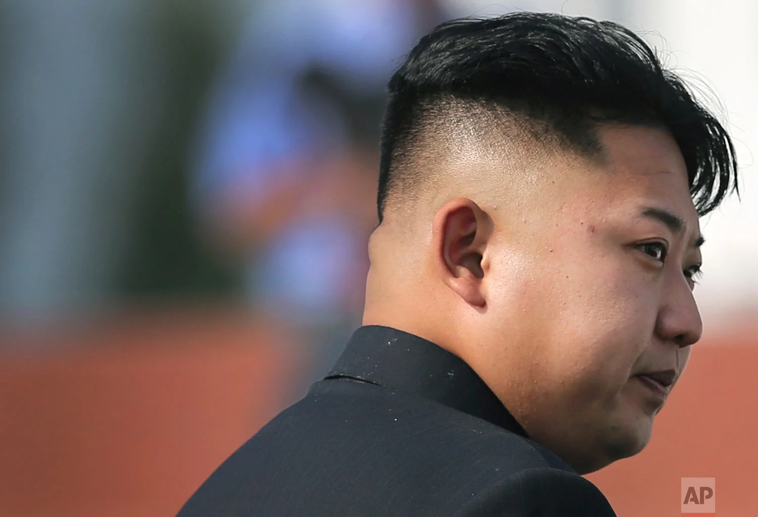 North Korean leader Kim Jong Un arrives at the cemetery for fallen fighters of the Korean People's Army in Pyongyang on July 25, 2013, during a ceremony marking the 60th anniversary of the signing of the armistice that halted fighting on the Korean peninsula. (AP Photo/Wong Maye-E)