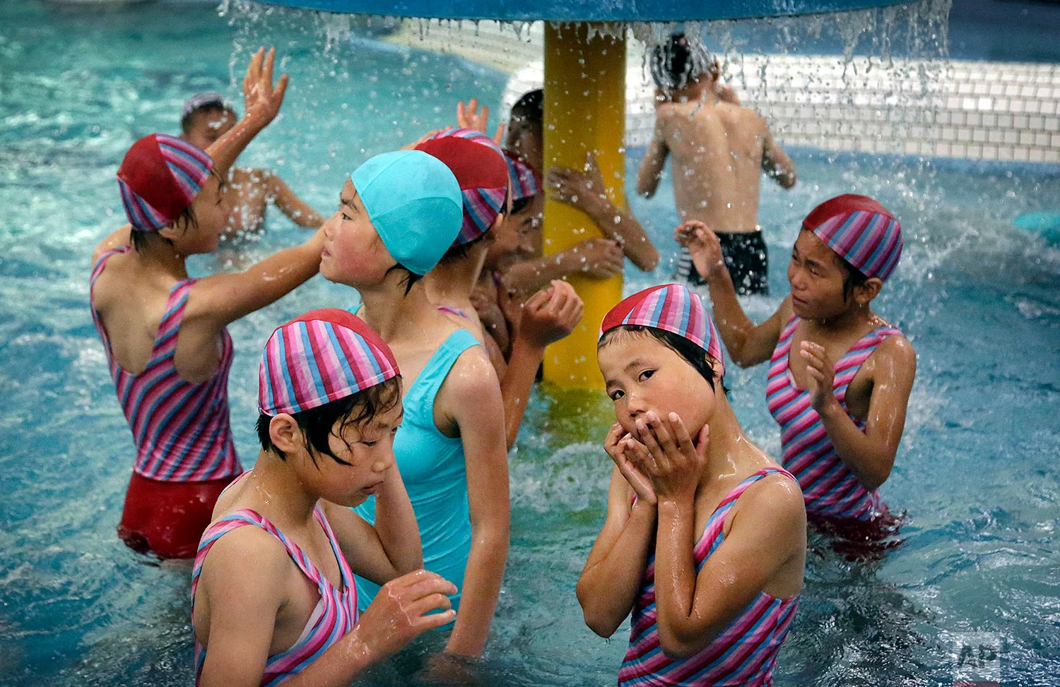 North Korean school children play in the aquatic center at the Songdowon International Children's Camp in Wonsan, North Korea, on June 23, 2016. The camp, which has been operating for about 30 years, was intended mainly to deepen relations with friendly countries in the Communist or non-aligned world. (AP Photo/Wong Maye-E)