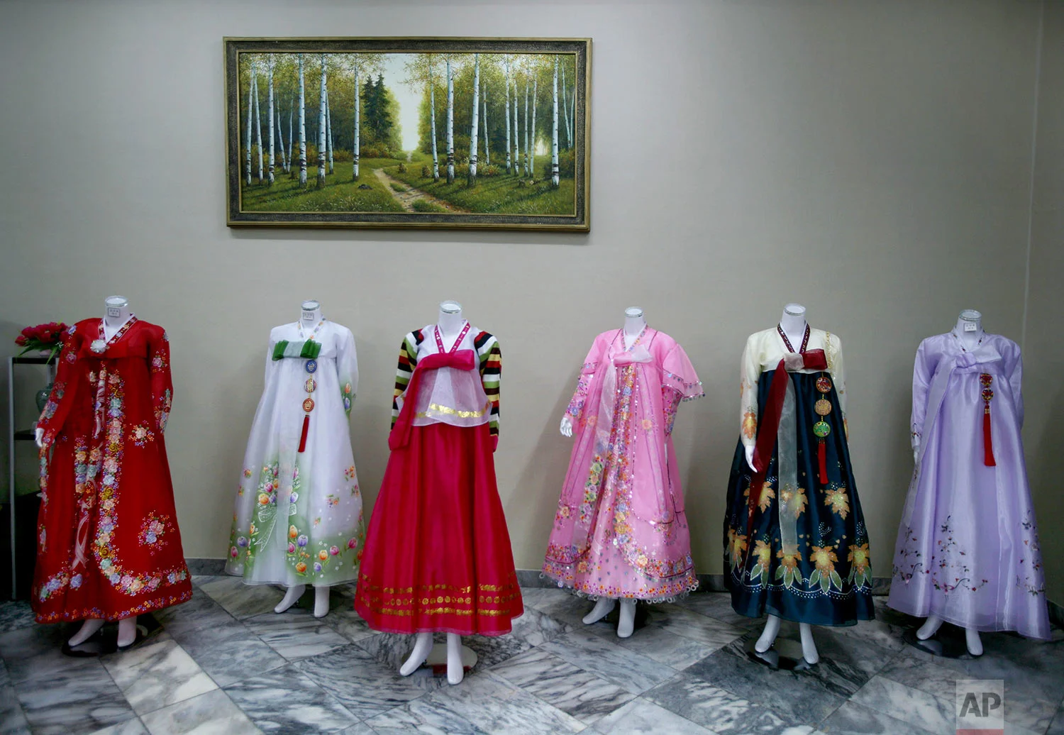 Dresses are displayed on mannequins at a hotel gift shop in Pyongyang, North Korea, on Feb. 27, 2008. (AP Photo/David Guttenfelder)