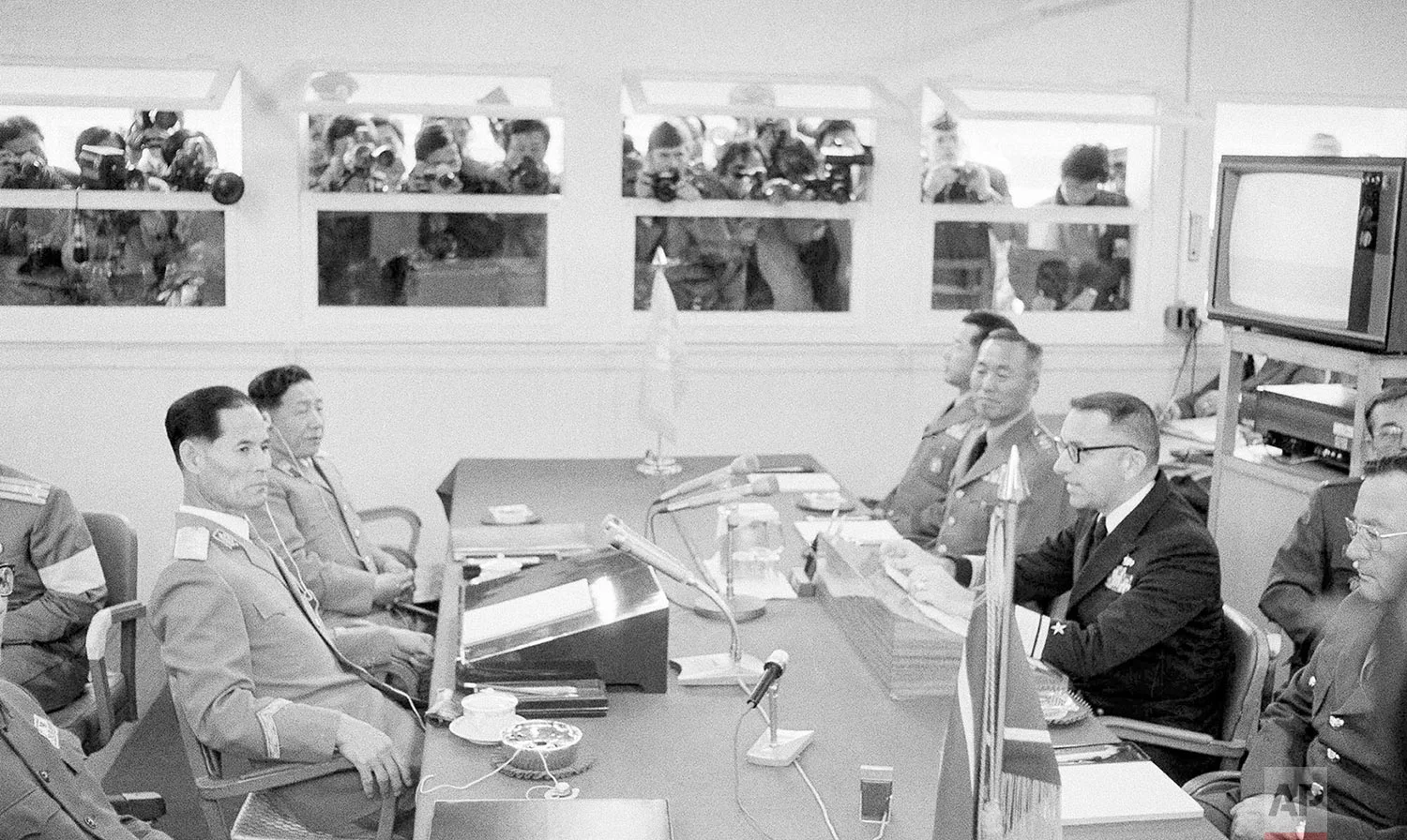 U.S. Vice Admiral Warren Hamm Jr., right, the senior negotiator for the United Nations Command, speaks at the 391st Military Armistice Commission (MAC) meeting at Panmunjom, Korea, on Oct. 27, 1978. Vice Adm. Hamm accused North Korea of digging an underground tunnel in the Demilitarized Zone into South Korea. At left is North Korean army Maj. Gen. Han Ju-Kyong, the North's chief MAC delegate. (AP Photo)