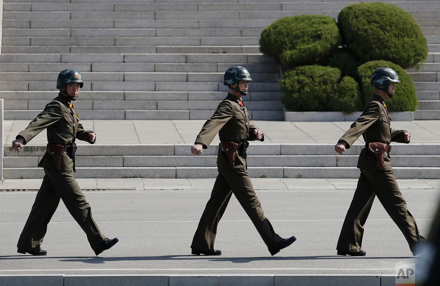 North Korean soldiers march at the border village of Panmunjom in the Demilitarized Zone that divides North and South Korea on April 18, 2018. (AP Photo/Lee Jin-man)