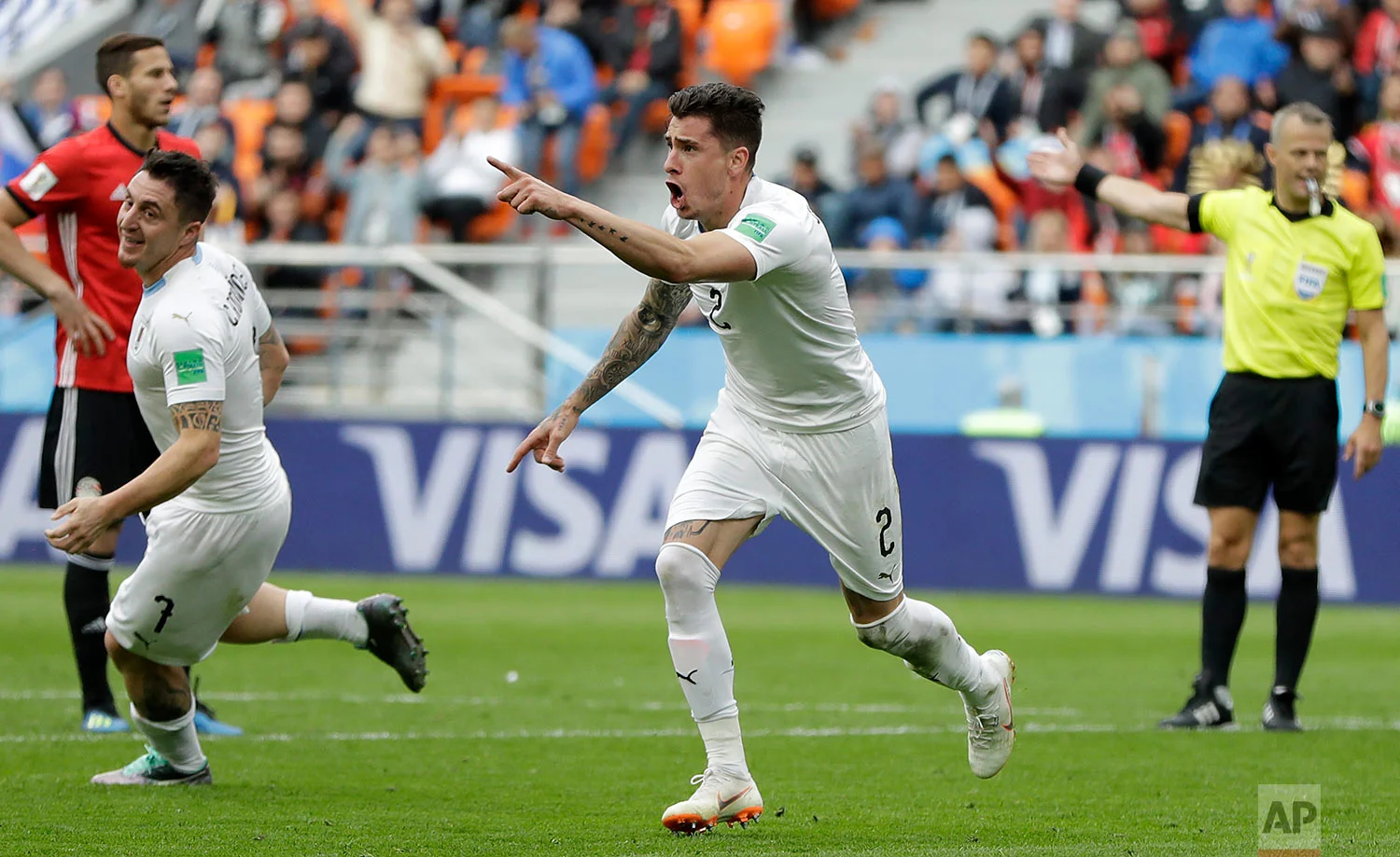 Uruguay's Jose Gimenez celebrates after scoring his side's opening goal during the group A match between Egypt and Uruguay at the 2018 soccer World Cup in the Yekaterinburg Arena in Yekaterinburg, Russia, Friday, June 15, 2018. (AP Photo/Natacha Pis