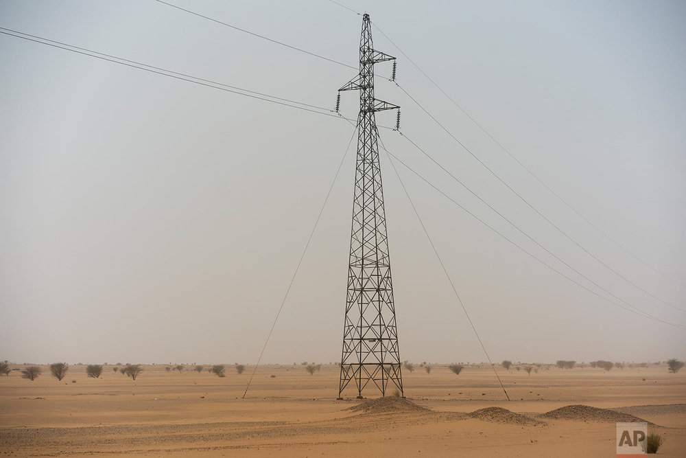  An electricity pylon stands in Niger's Tenere desert region of the south central Sahara on May 30, 2018. (AP Photo/Jerome Delay) 