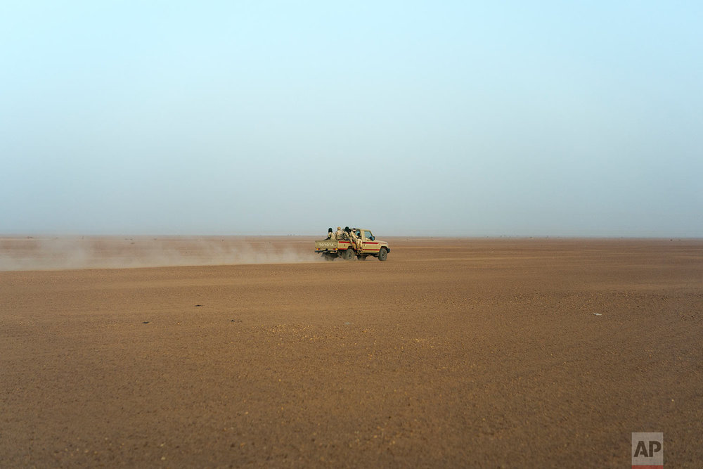  A Nigerian army pickup drives Niger's Tenere desert region of the south central Sahara on June 3, 2018. (AP Photo/Jerome Delay) 