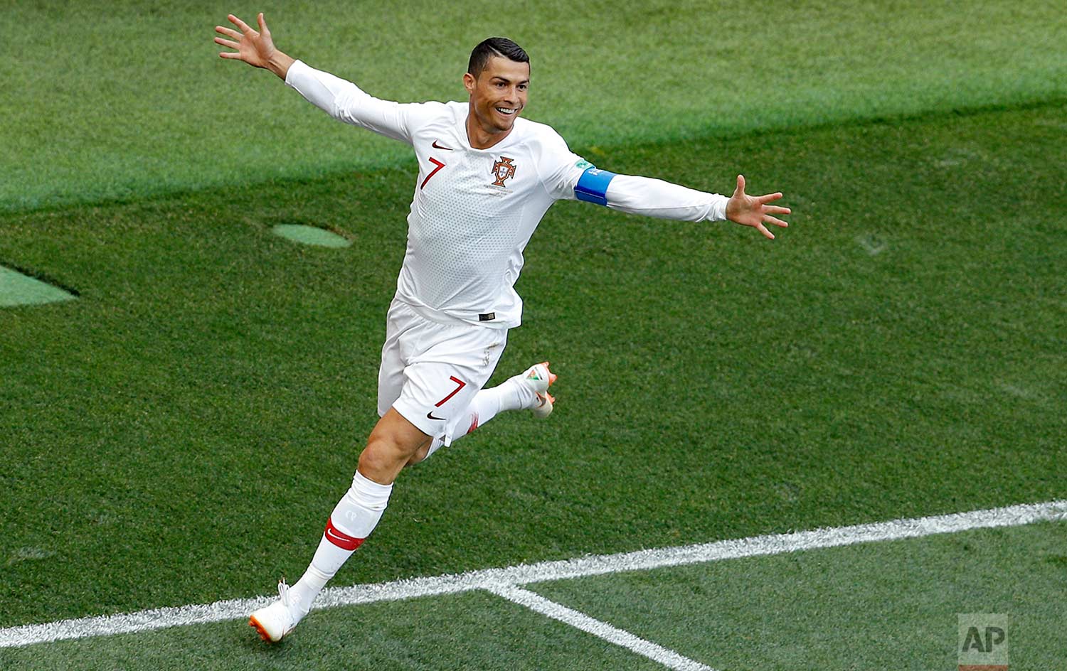  Portugal's Cristiano Ronaldo celebrates after scoring the opening goal during the group B match between Portugal and Morocco at the 2018 soccer World Cup in the Luzhniki Stadium in Moscow, Russia, Wednesday, June 20, 2018. (AP Photo/Victor Caivano) 