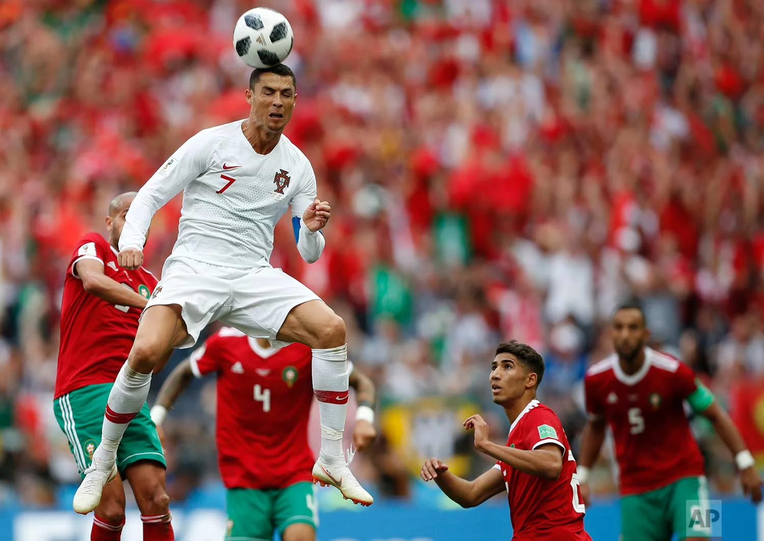 Portugal's Cristiano Ronaldo leaps up for a header during the group B match between Portugal and Morocco at the 2018 soccer World Cup in the Luzhniki Stadium in Moscow, Russia, Wednesday, June 20, 2018. (AP Photo/Francisco Seco)