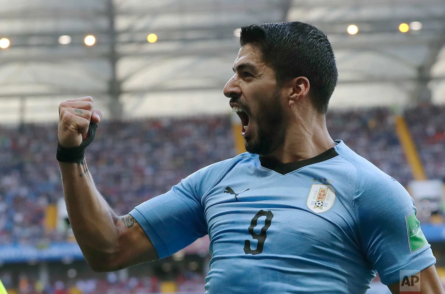 Uruguay's Luis Suarez celebrates scoring his side's first goal during the group A match against Saudi Arabia at the 2018 soccer World Cup in Rostov Arena in Rostov-on-Don, Russia, Wednesday, June 20, 2018. (AP Photo/Andrew Medichini)