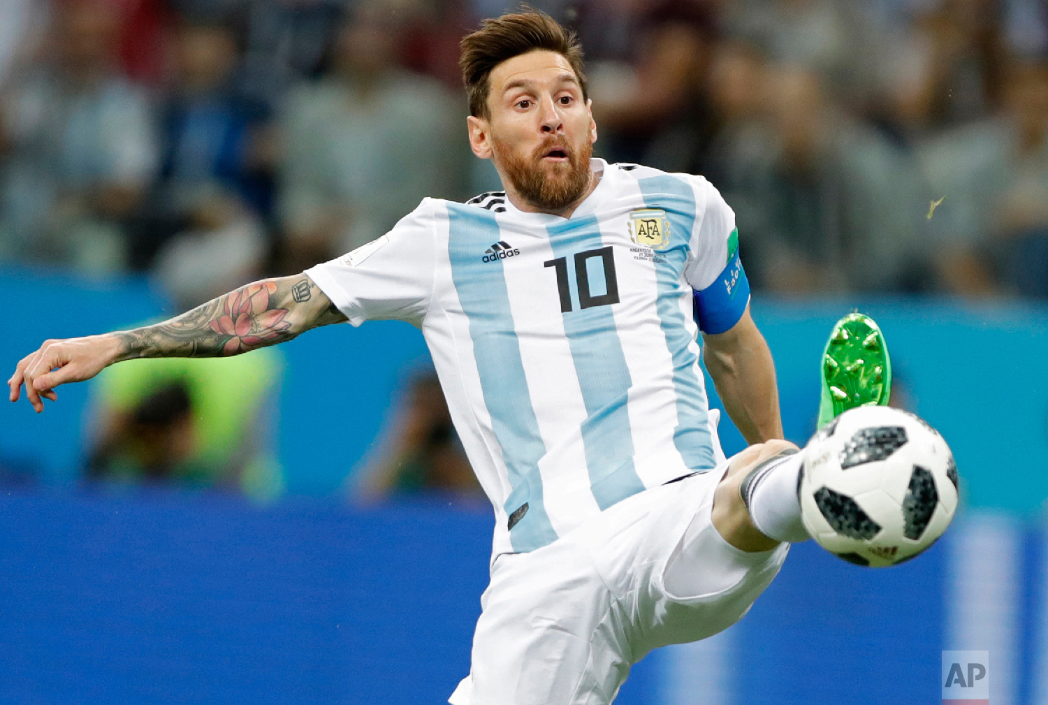 Argentina's Lionel Messi reaches for the ball during the group D match between Argentina and Croatia at the 2018 soccer World Cup in Nizhny Novgorod Stadium in Nizhny Novgorod, Russia, Thursday, June 21, 2018. (AP Photo/Ricardo Mazalan)