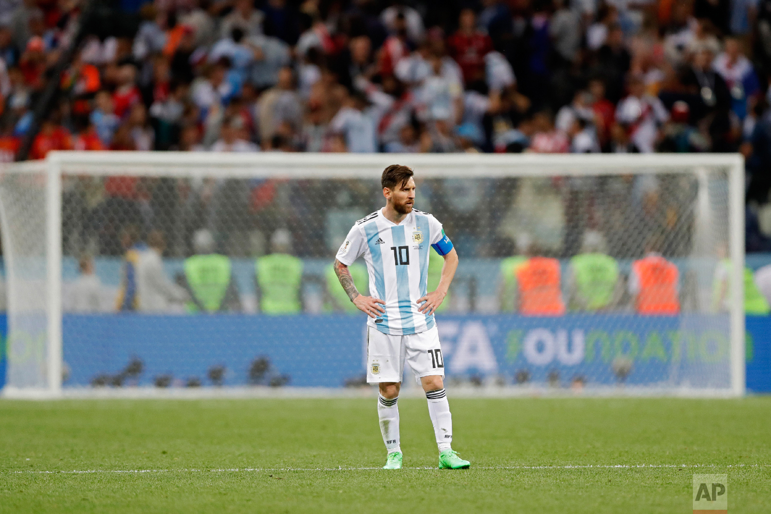 Argentina's Lionel Messi stands on the pitch at the end of the group D match between Argentina and Croatia at the 2018 soccer World Cup in Nizhny Novgorod Stadium in Nizhny Novgorod, Russia, Thursday, June 21, 2018. Croatia defeated Argentina 3-0. (AP Photo/Ricardo Mazalan)