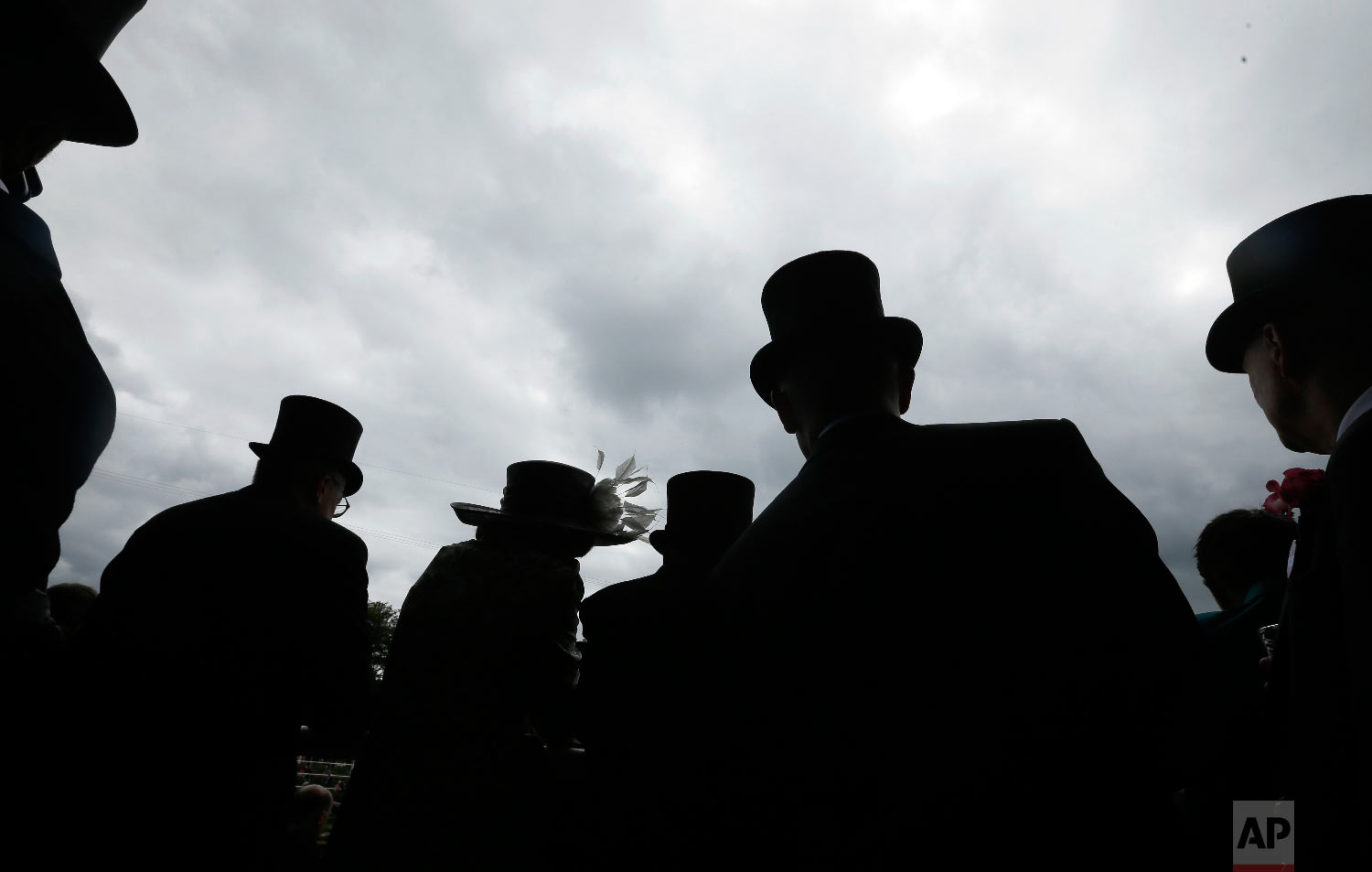  Racegoers on the first day of the Royal Ascot horse race meeting in Ascot, England, Tuesday, June 19, 2018. (AP Photo/Tim Ireland) 