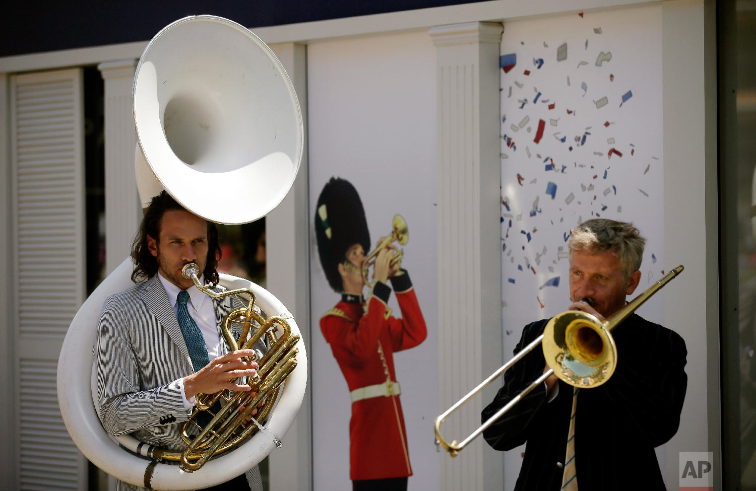  Musicians play instruments on the third day of the Royal Ascot horse race meeting, which is traditionally known as Ladies Day, in Ascot, England Thursday, June 21, 2018. (AP Photo/Tim Ireland) 