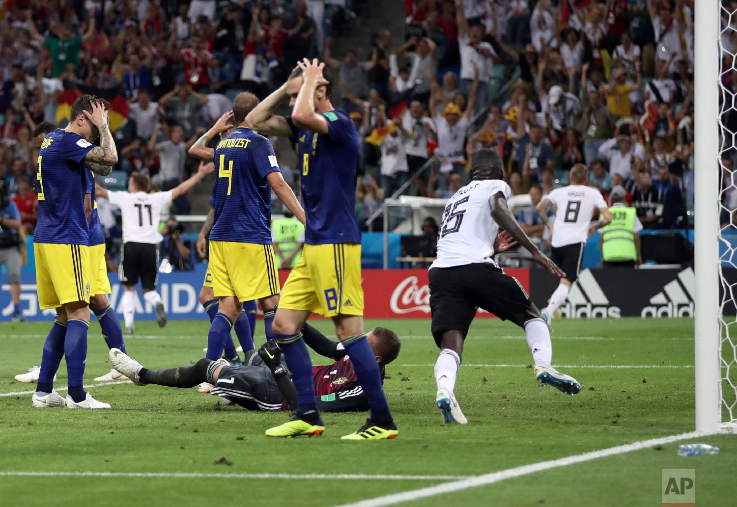Sweden players reacts after Germany's Toni Kroos, right, scores his side's second goal during the group F match between Germany and Sweden at the 2018 soccer World Cup in the Fisht Stadium in Sochi, Russia, Saturday, June 23, 2018. (AP Photo/Thanassis Stavrakis)