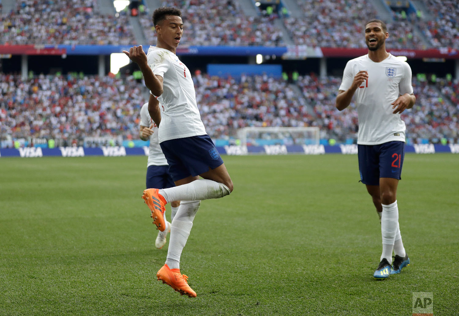 England's Jesse Lingard reacts as he celebrates after scoring his team's third goal during the group G match between England and Panama at the 2018 soccer World Cup at the Nizhny Novgorod Stadium in Nizhny Novgorod , Russia, Sunday, June 24, 2018. (AP Photo/Matthias Schrader)