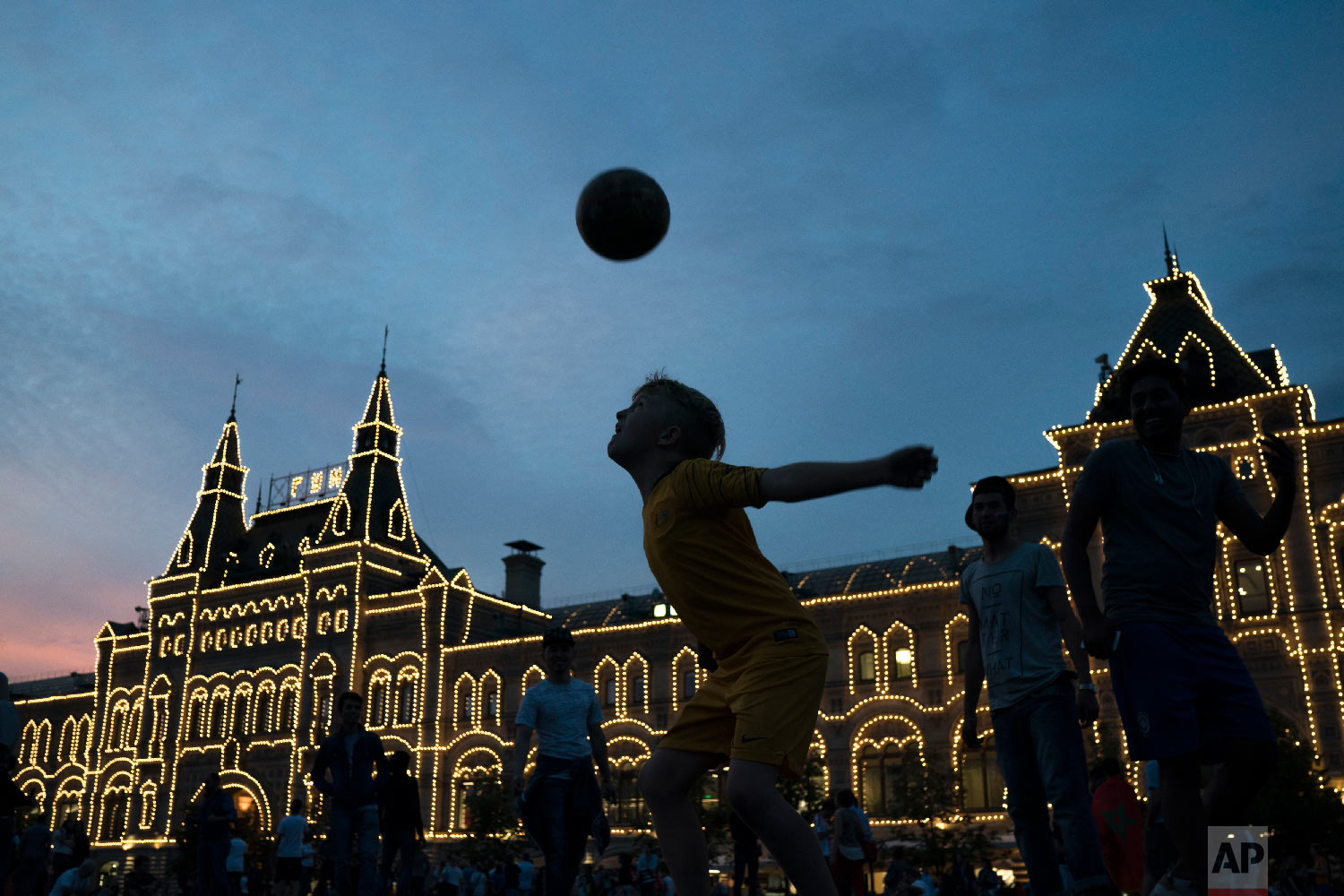  People play soccer at the Red Square during the 2018 soccer World Cup in Moscow, Russia on June 19, 2018. (AP Photo/Felipe Dana) 
