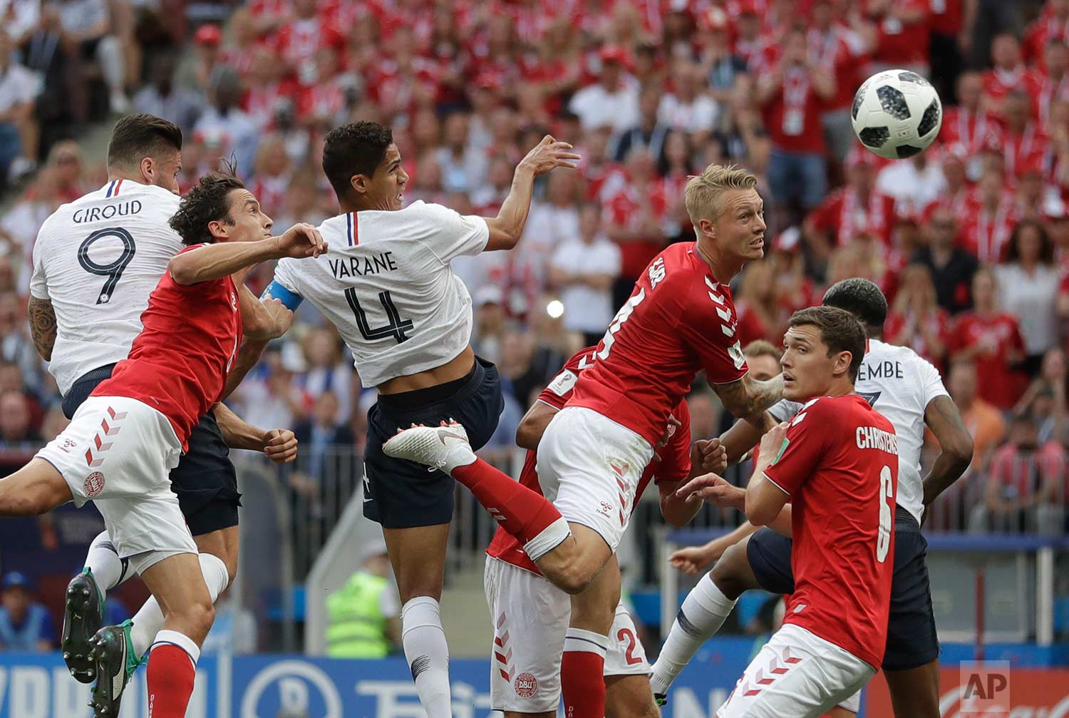  Denmark's Simon Kjaer, top centre right, heads the ball under pressure from France's Raphael Varane top center left, during the group C match between Denmark and France at the 2018 soccer World Cup at the Luzhniki Stadium in Moscow, Russia, Tuesday,
