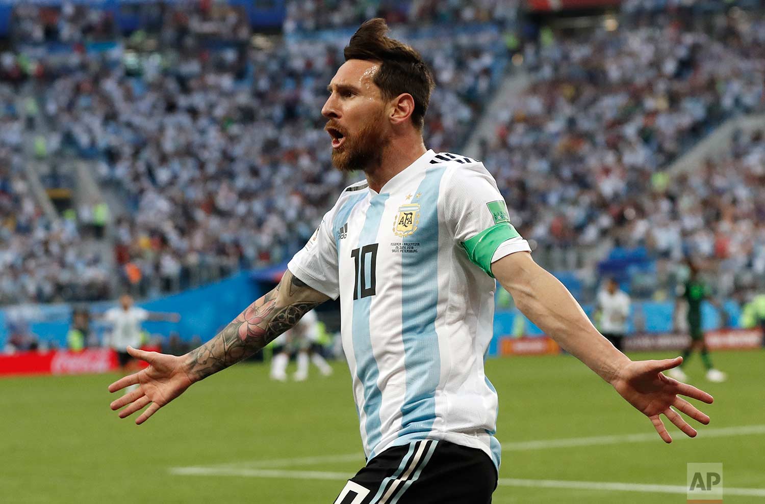  Argentina's Lionel Messi celebrates after scoring the opening goal of his team during the group D match between Argentina and Nigeria, at the 2018 soccer World Cup in the St. Petersburg Stadium in St. Petersburg, Russia, Tuesday, June 26, 2018. (AP 