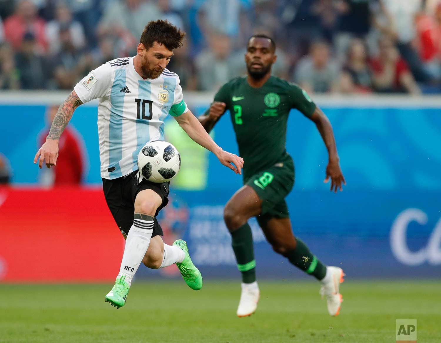  Argentina's Lionel Messi controls the ball during the group D match between Argentina and Nigeria, at the 2018 soccer World Cup in the St. Petersburg Stadium in St. Petersburg, Russia, Tuesday, June 26, 2018. (AP Photo/Ricardo Mazalan) 