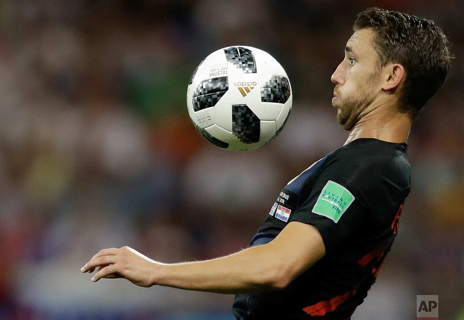 Croatia's Josip Pivaric prepares to chest the ball during the group D match between Iceland and Croatia, at the 2018 soccer World Cup in the Rostov Arena in Rostov-on-Don, Russia, Tuesday, June 26, 2018. (AP Photo/Natacha Pisarenko)