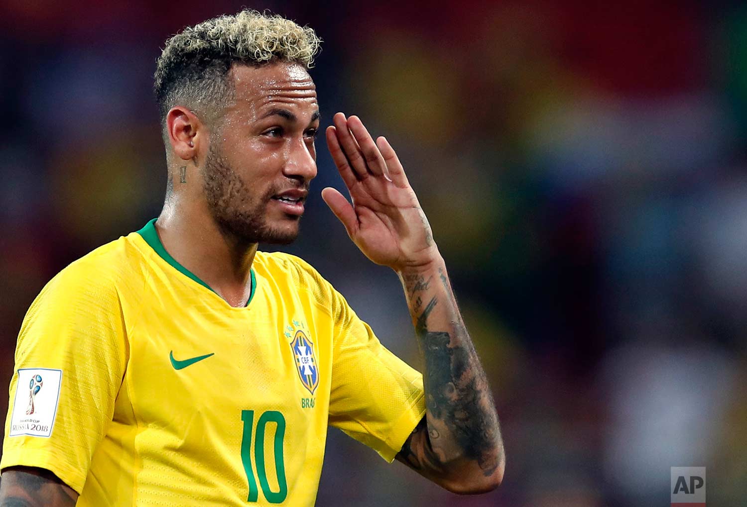 Brazil's Neymar gestures as Brazil won the group E match between Serbia and Brazil, at the 2018 soccer World Cup in the Spartak Stadium in Moscow, Russia, Wednesday, June 27, 2018. (AP Photo/Rebecca Blackwell)