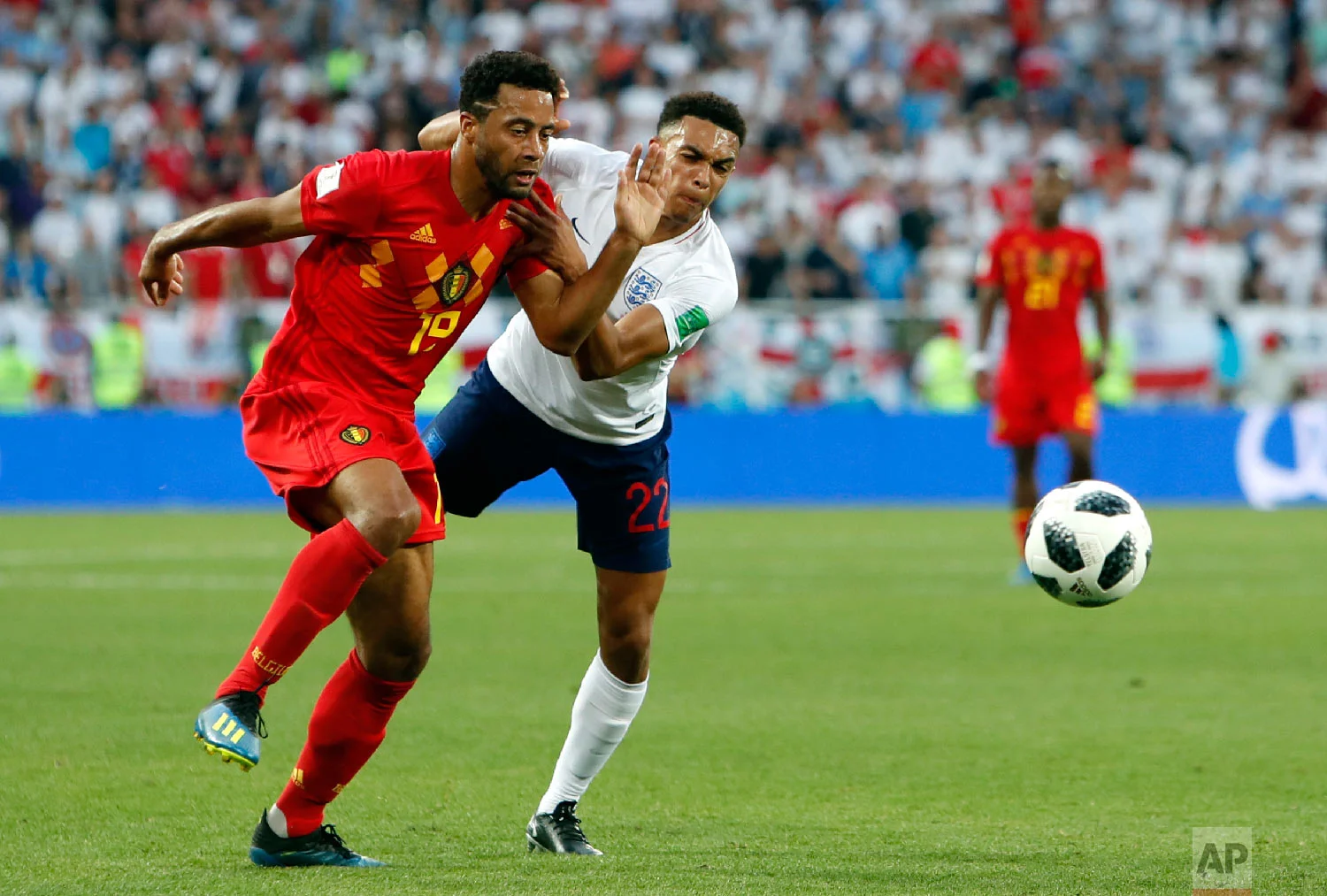 Belgium's Moussa Dembele vies for the ball with England's Trent Alexander-Arnold, right, during the group G match between England and Belgium at the 2018 soccer World Cup in the Kaliningrad Stadium in Kaliningrad, Russia, Thursday, June 28, 2018. (AP Photo/Alastair Grant)
