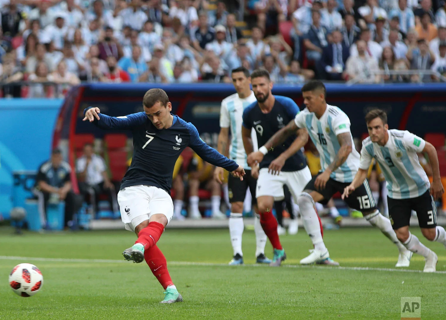 France's Antoine Griezmann scores his side's opening goal on a penalty during the round of 16 match between France and Argentina, at the 2018 soccer World Cup at the Kazan Arena in Kazan, Russia, Saturday, June 30, 2018. (AP Photo/Thanassis Stavrakis)