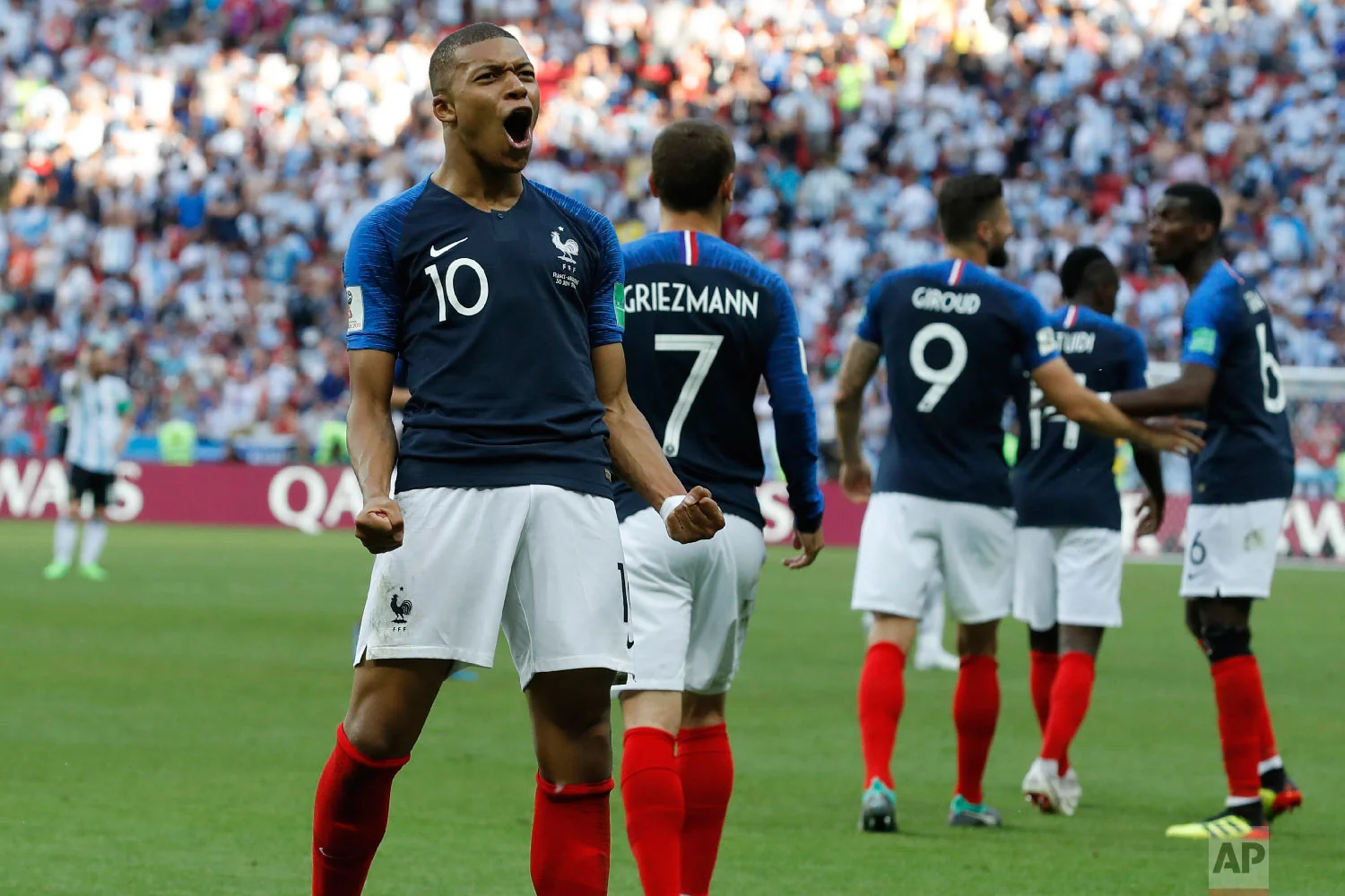 France's Kylian Mbappe celebrates after scoring his side's third goal during the round of 16 match between France and Argentina, at the 2018 soccer World Cup at the Kazan Arena in Kazan, Russia, Saturday, June 30, 2018. (AP Photo/David Vincent)