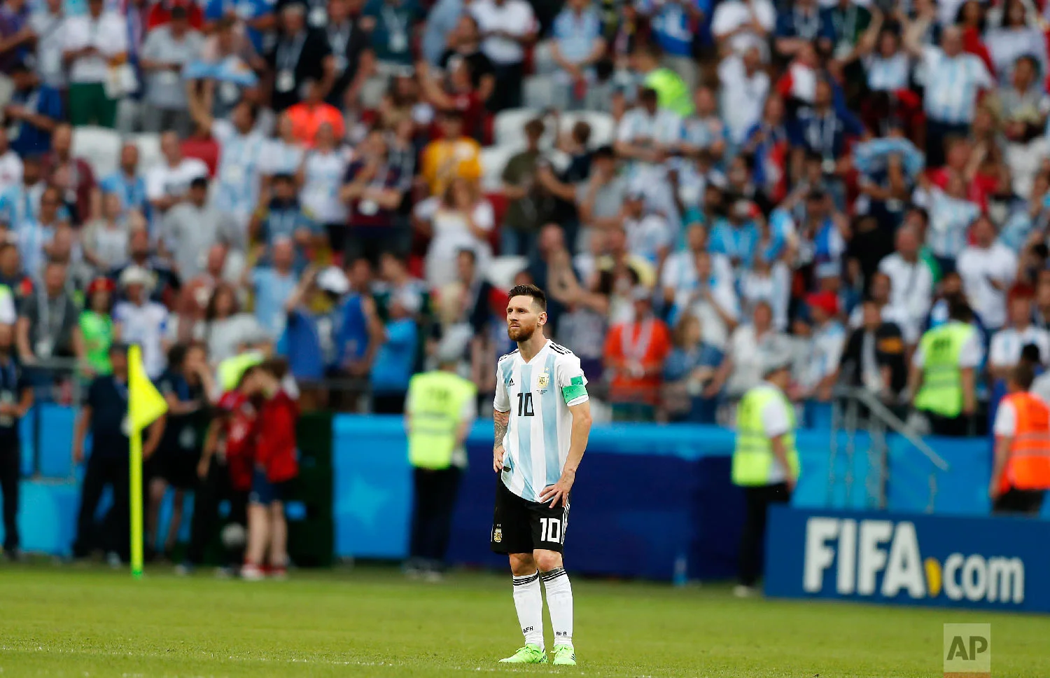 Argentina's Lionel Messi stands on the pitch at the end of the round of 16 match between France and Argentina, at the 2018 soccer World Cup at the Kazan Arena in Kazan, Russia, Saturday, June 30, 2018. France won 4-3. (AP Photo/Frank Augstein)