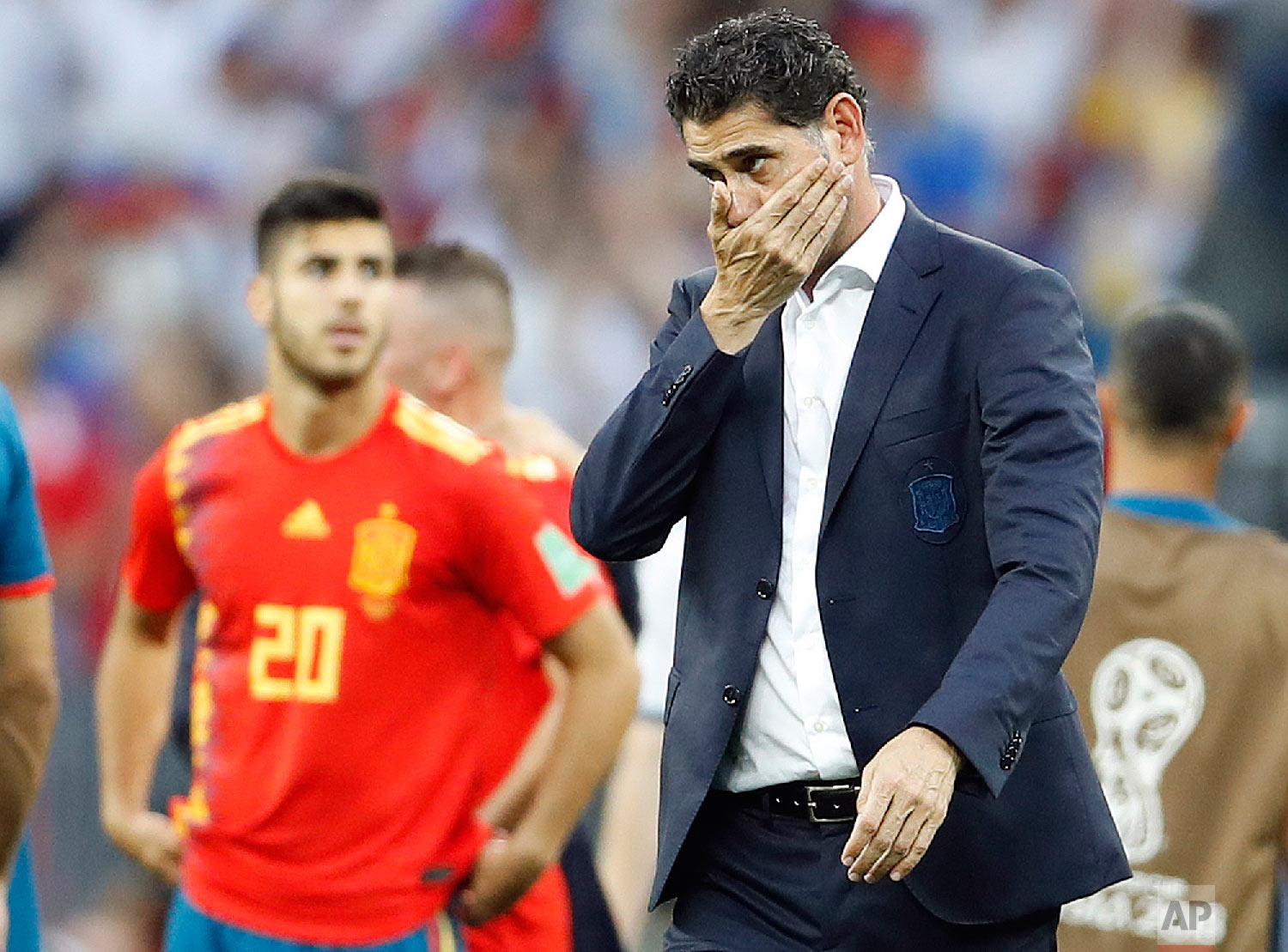 Spain head coach Fernando Hierro reacts after his team lost by penalty shootout during the round of 16 match between Spain and Russia at the 2018 soccer World Cup at the Luzhniki Stadium in Moscow, Russia, Sunday, July 1, 2018. (AP Photo/Antonio Calanni)