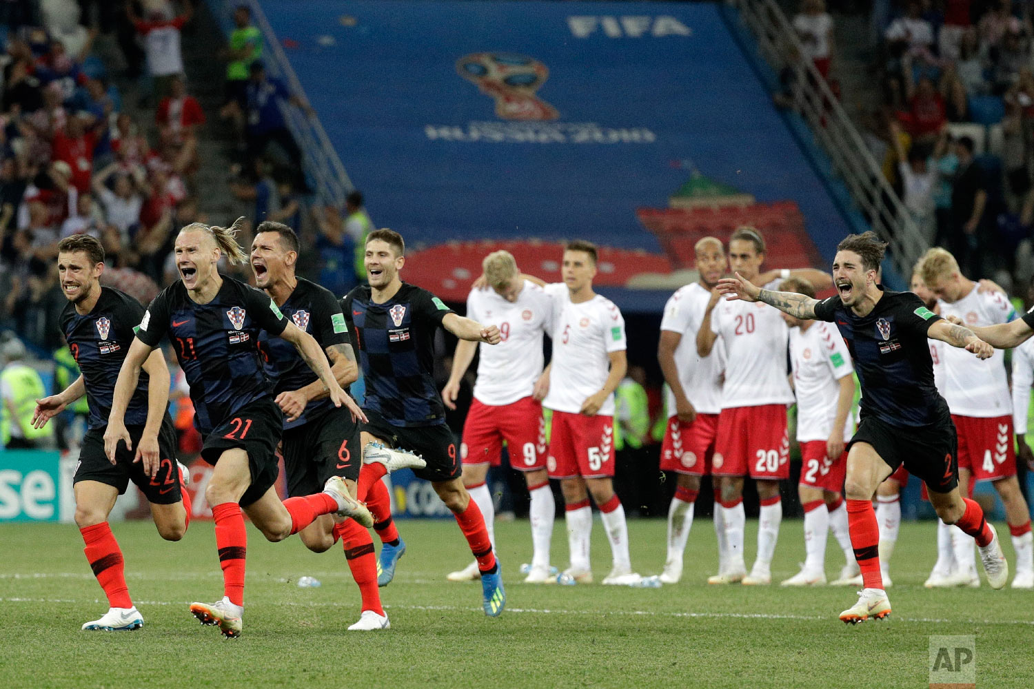 Croatians players celebrate after the penalties during the round of 16 match between Croatia and Denmark at the 2018 soccer World Cup in the Nizhny Novgorod Stadium, in Nizhny Novgorod, Russia, Sunday, July 1, 2018. Croatia eliminates Denmark 3-2 on