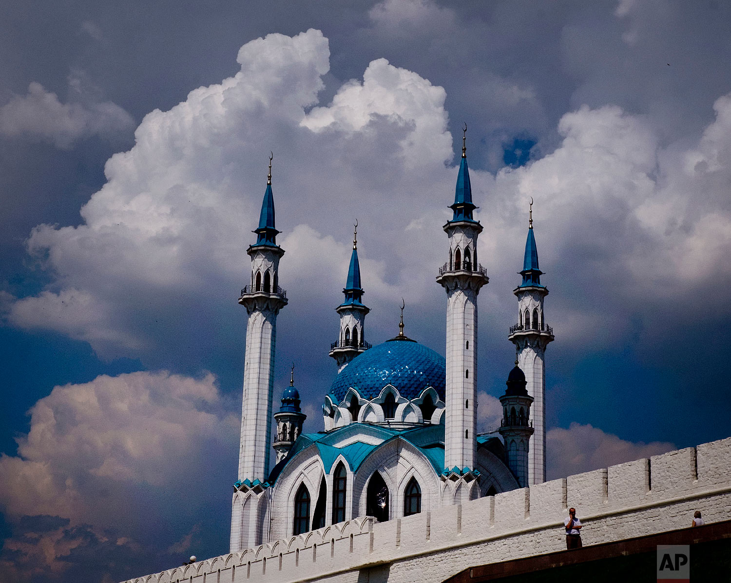  Clouds hang over the Grand Mosque of the Kremlin during the 2018 soccer World Cup in Kazan, Russia on June 26, 2018. (AP Photo/Michael Probst) 