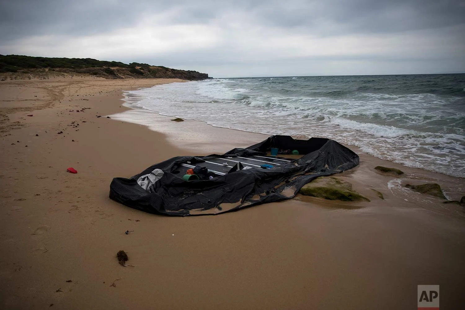 In this Thursday, June 28, 2018 photo, a rubber dinghy used by Moroccan migrants, is seen near Tarifa, in the south of Spain. The route from northern Africa into Spain has become the most popular for those seeking a better life in Europe, testing Spain’s response networks as the migration debate re-emerges in the region. (AP Photo/Emilio Morenatti)
