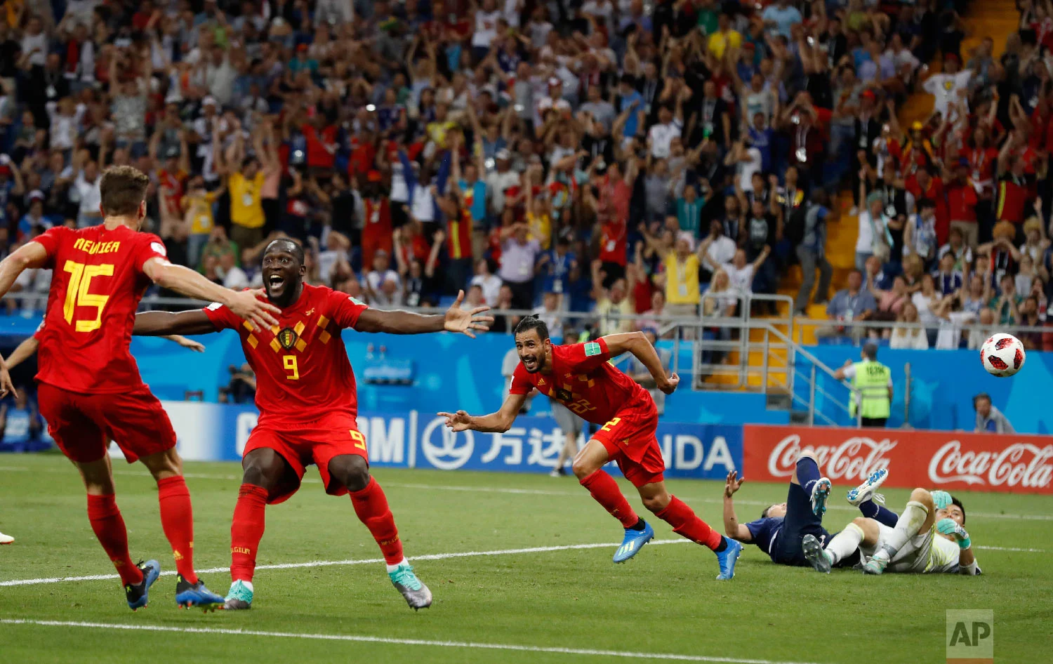 Belgium's Nacer Chadli, second right, celebrates after scoring his third side's goal during the round of 16 match between Belgium and Japan at the 2018 soccer World Cup in the Rostov Arena, in Rostov-on-Don, Russia, Monday, July 2, 2018. (AP Photo/Rebecca Blackwell)