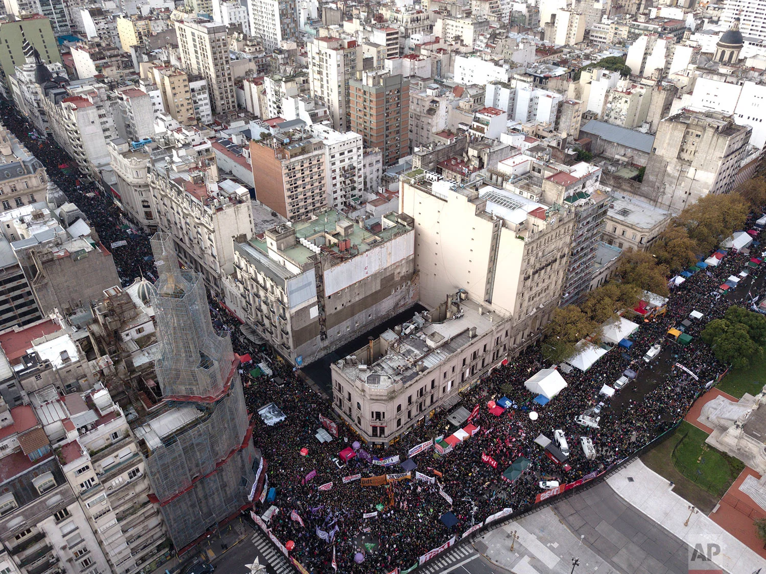 Pro-choice protesters gather near Congress as lawmakers debate a proposed law to legalize abortion in Buenos Aires, June 13, 2018. The measure would allow elective abortions in the first 14 weeks. (AP Photo/Jorge Saenz)