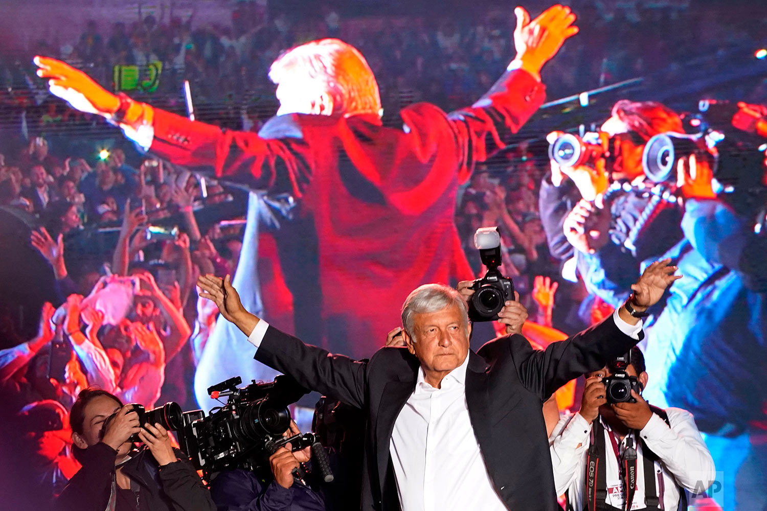  Presidential candidate Andres Manuel Lopez Obrador arrives for his closing campaign rally at Azteca stadium in Mexico City, June 27, 2018, before winning in a landslide. (AP Photo/Ramon Espinosa) 