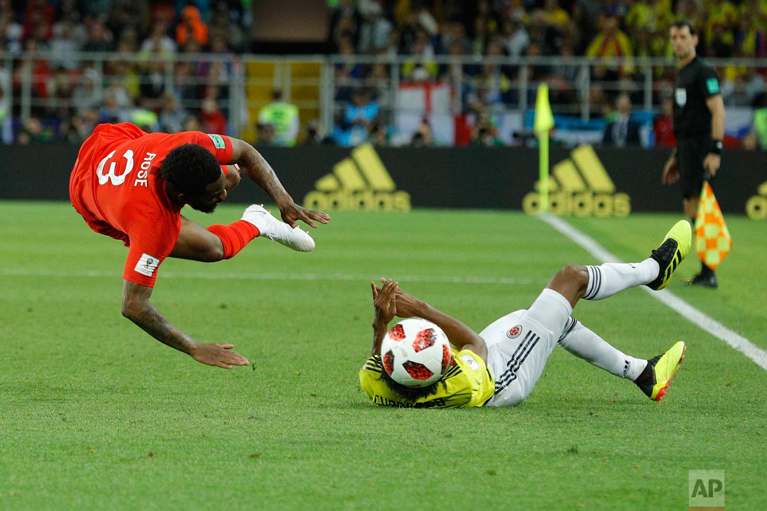  Colombia's Juan Cuadrado, right, fouls England's Danny Rose during the round of 16 match between Colombia and England at the 2018 soccer World Cup in the Spartak Stadium, in Moscow, Russia, Tuesday, July 3, 2018. (AP Photo/Victor R. Caivano) 