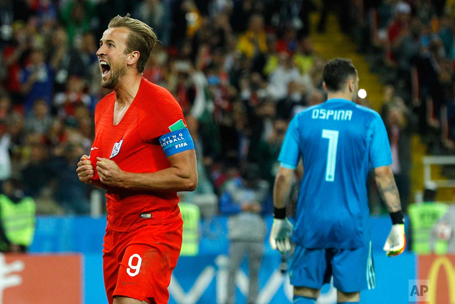 England's Harry Kane celebrates after scoring his side's first goal during the round of 16 match between Colombia and England at the 2018 soccer World Cup in the Spartak Stadium, in Moscow, Russia, Tuesday, July 3, 2018. (AP Photo/Victor R. Caivano)